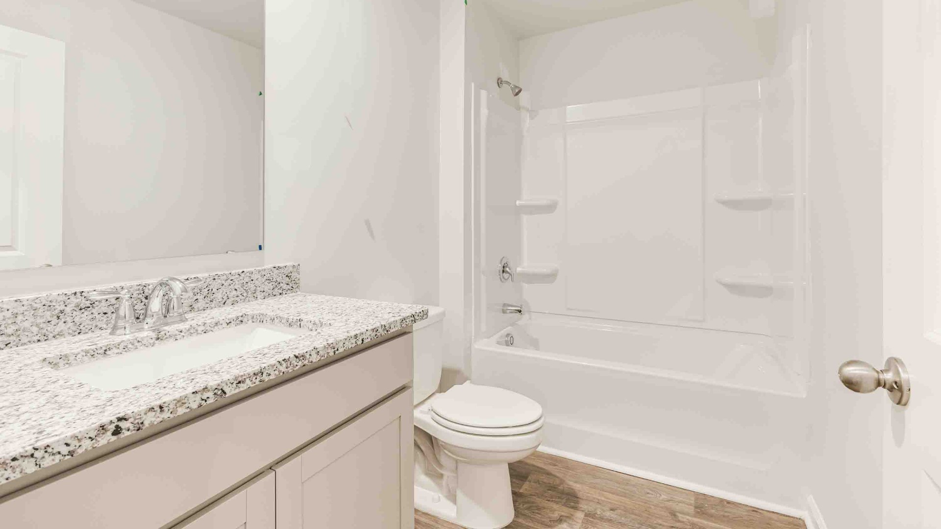 There are three additional bedrooms and full bath. In every bedroom you’ll have vinyl flooring and a closet in each room. Whether these rooms become bedrooms, office spaces, or other bonus rooms, there is sure to be comfort.