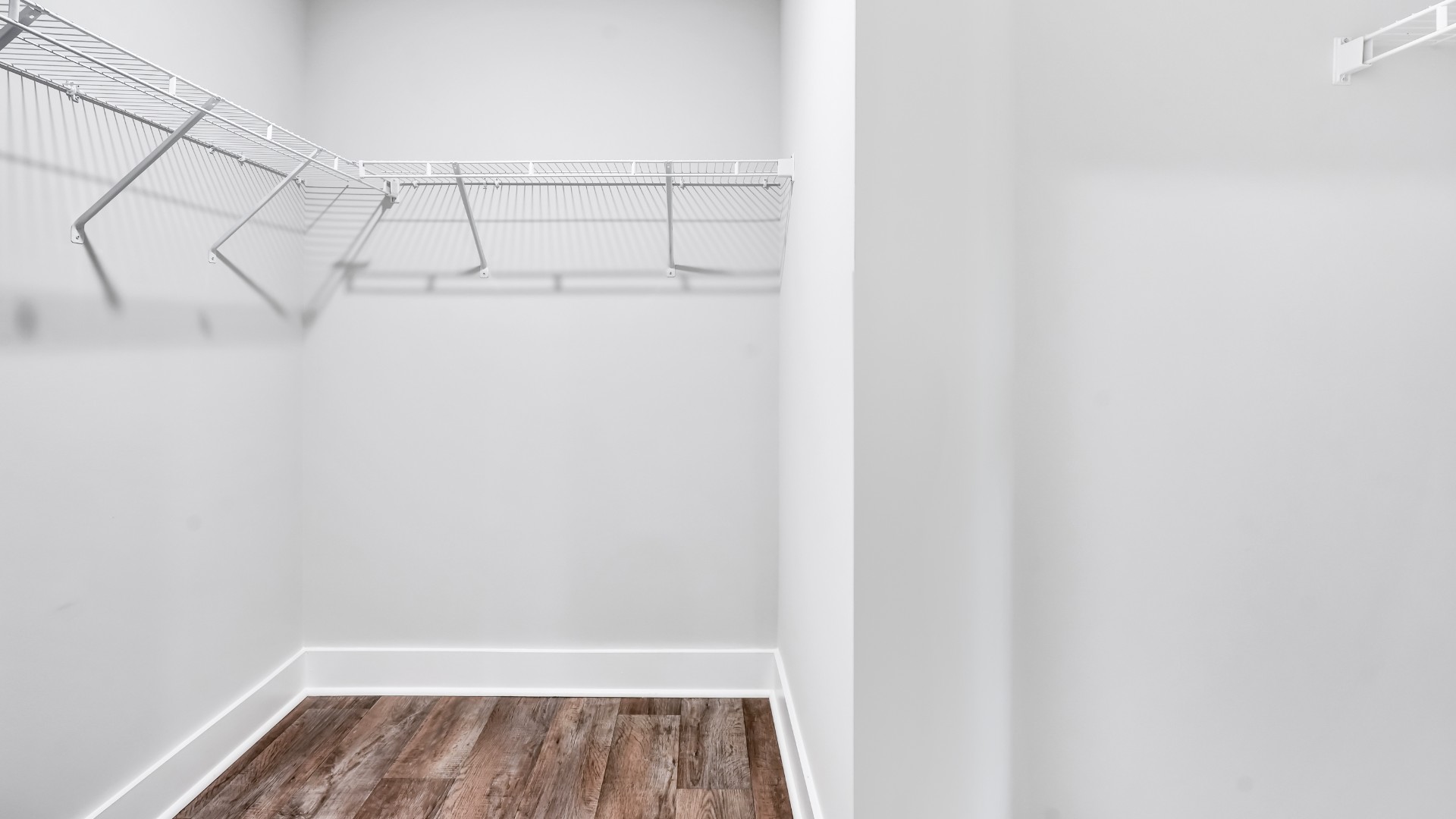 The primary bedroom has its own attached bathroom that features a walk-in closet and all the space you need to get ready in the morning.