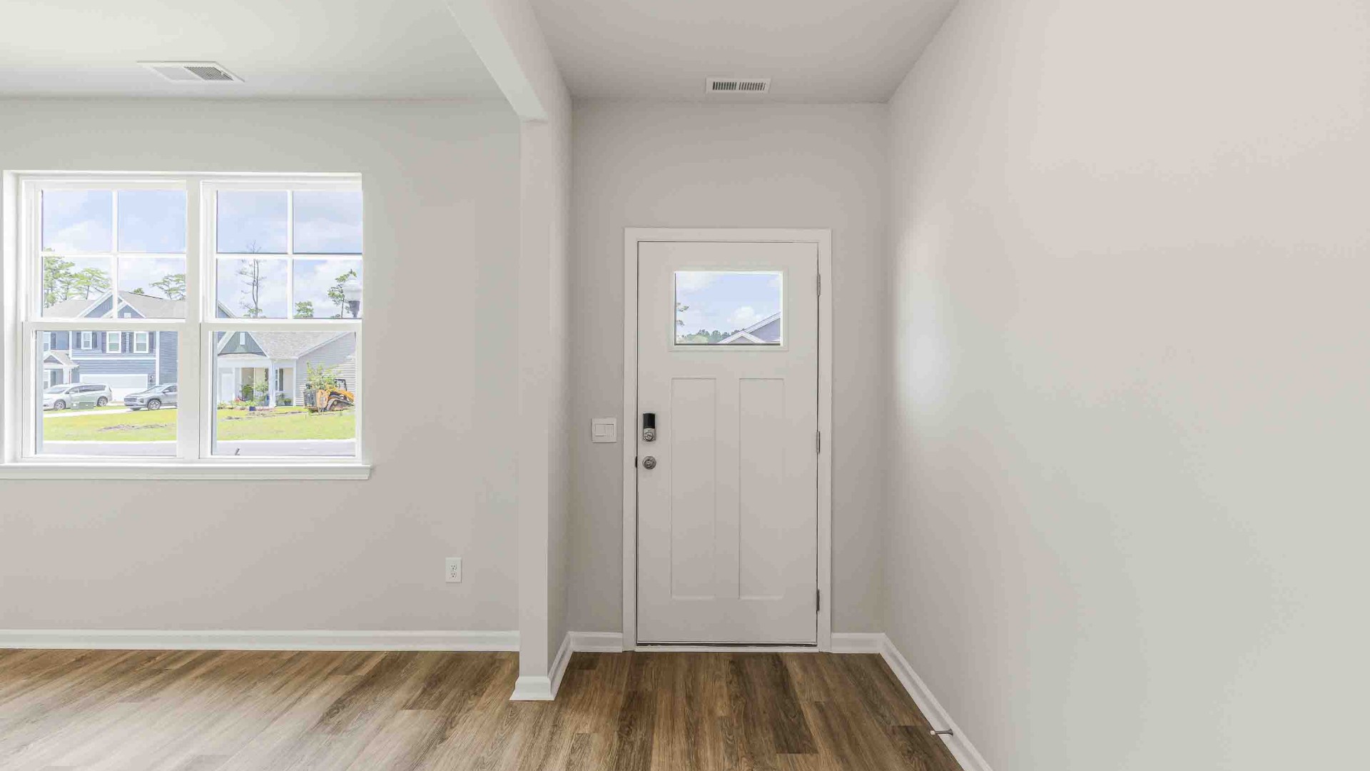 . Downstairs, a flex room can be used as an office or sitting area.