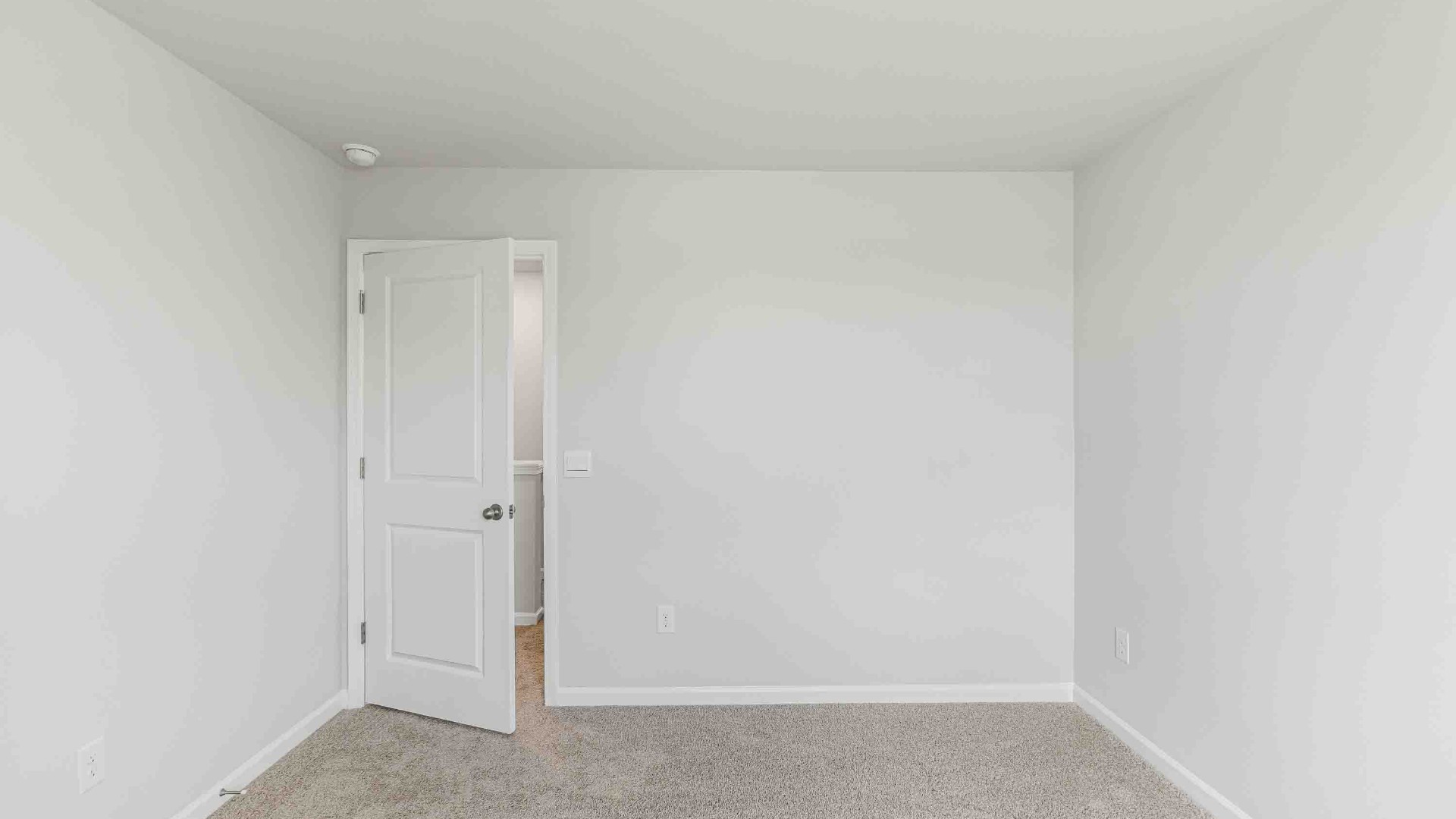 Downstairs, a flex room can be used as an office or sitting area.