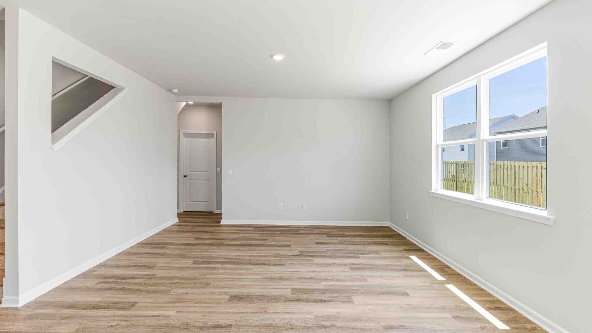 Downstairs, a flex room can be used as an office or sitting area.