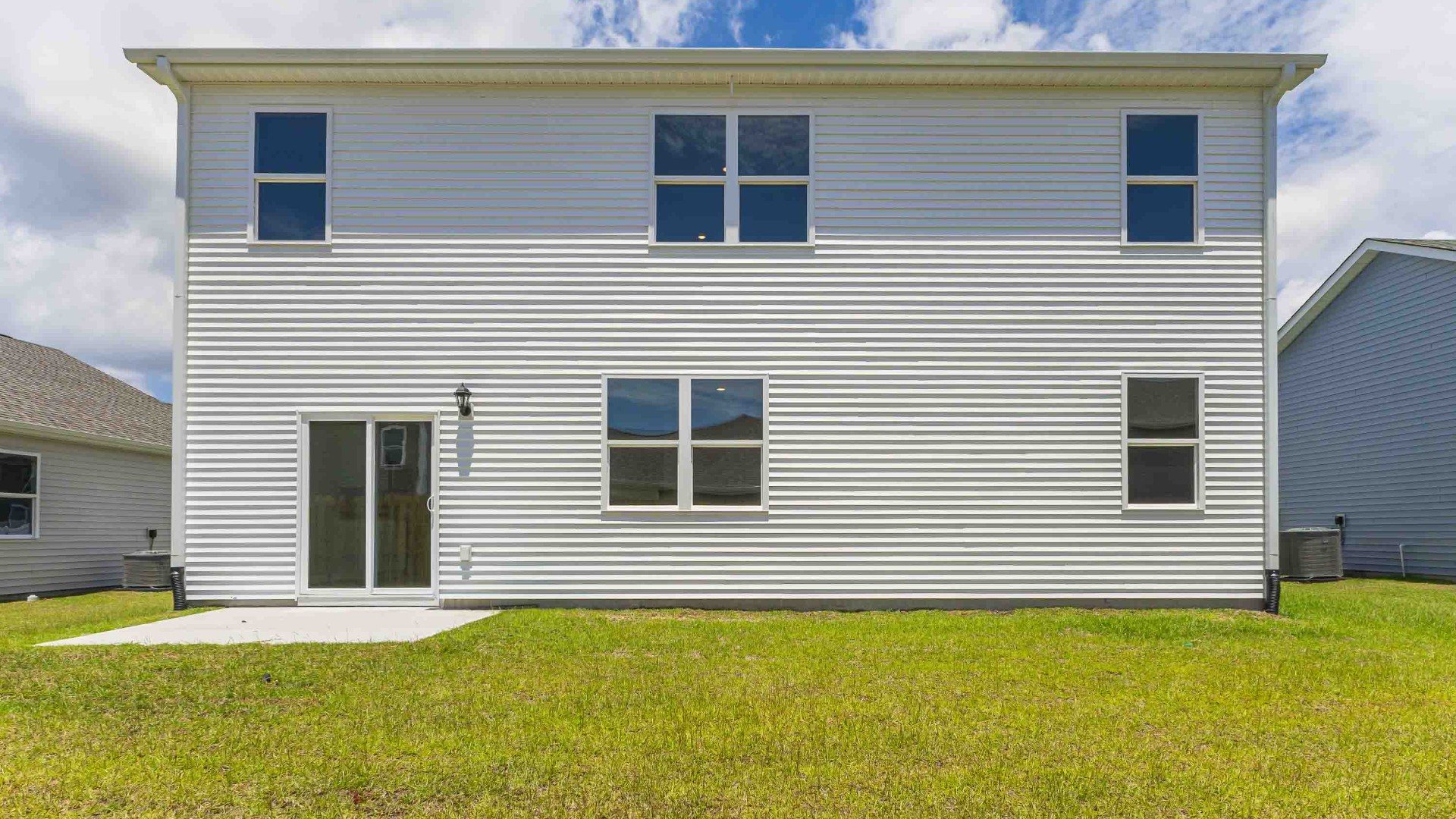 Enjoy the patio perfect for entertaining and enjoying the Carolina evenings. If you're seeking a spacious home with modern features, the Hayden Floorplan is a top choice.