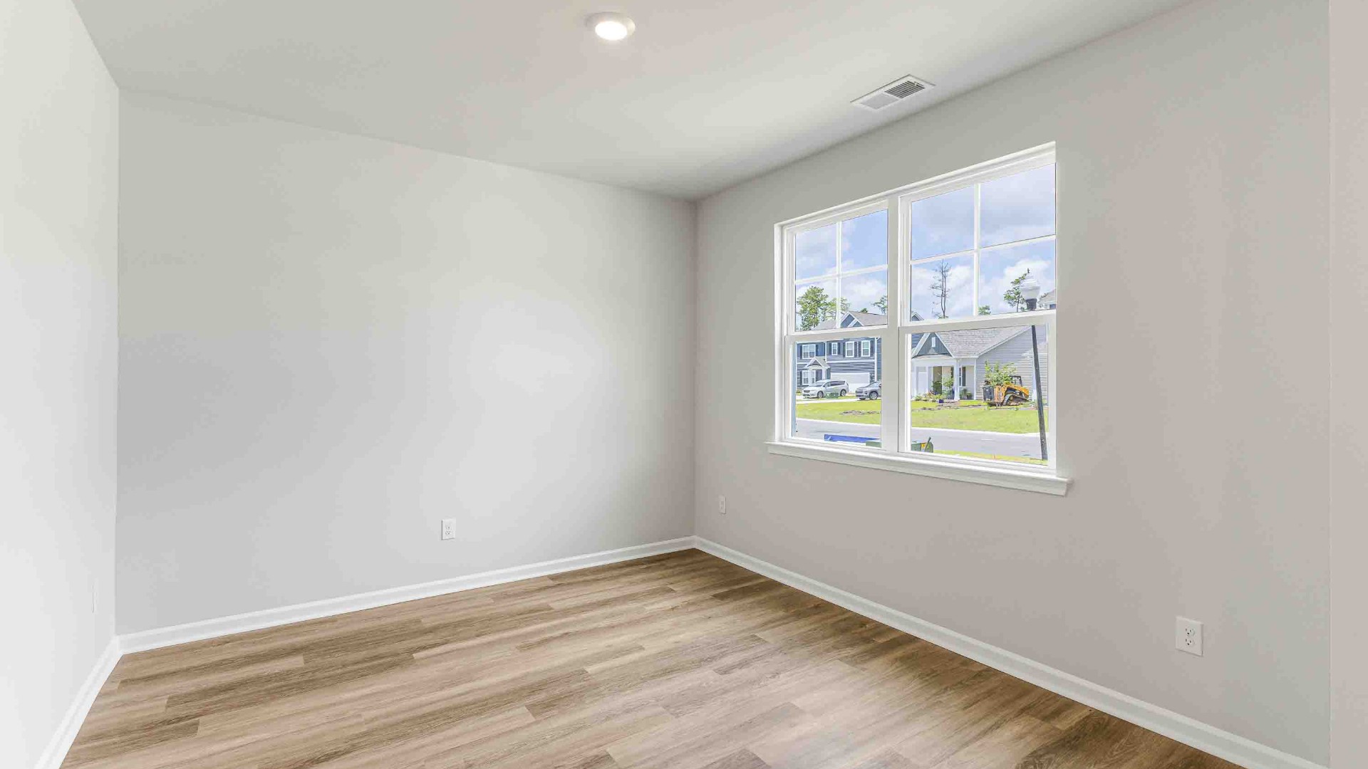 Downstairs, a flex room can be used as an office or sitting area.