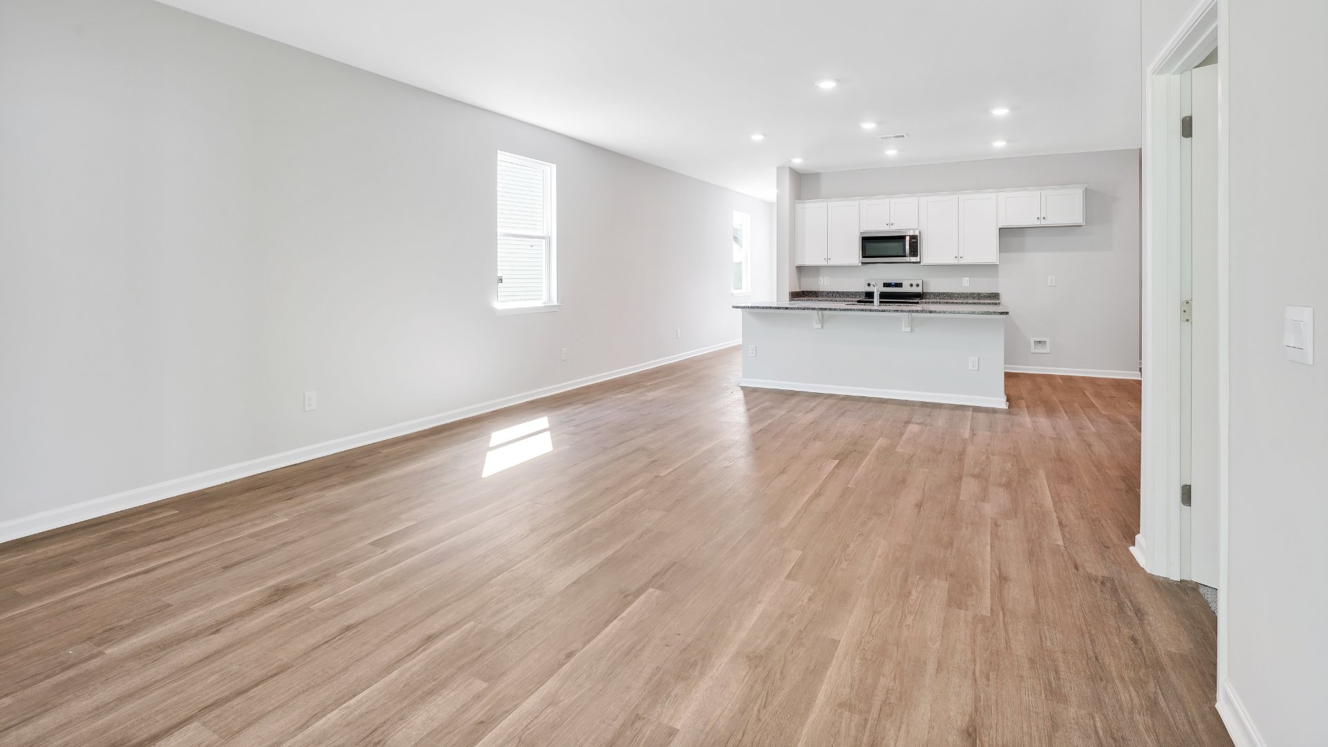 The living area is an open concept, where your kitchen, living, and dining areas blend seamlessly into a space perfect for everyday living and entertaining.