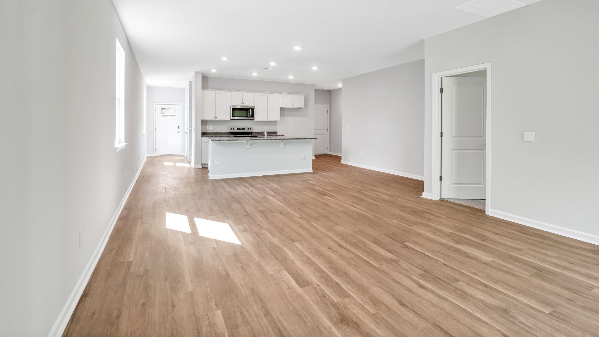 The living area is an open concept, where your kitchen, living, and dining areas blend seamlessly into a space perfect for everyday living and entertaining.