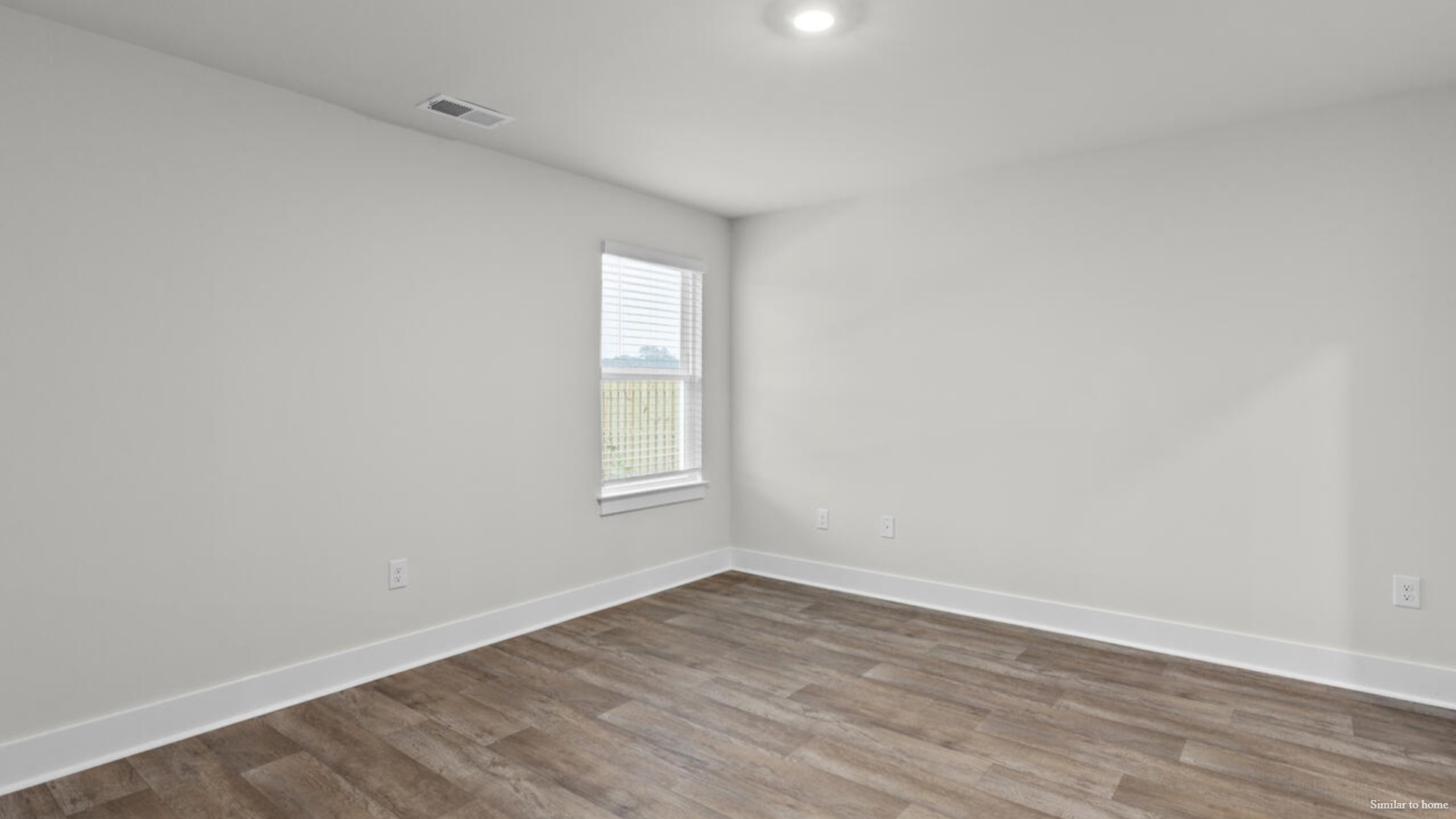 The primary bedroom has its own attached bathroom that features a walk-in closet and all the space you need to get ready in the morning.
