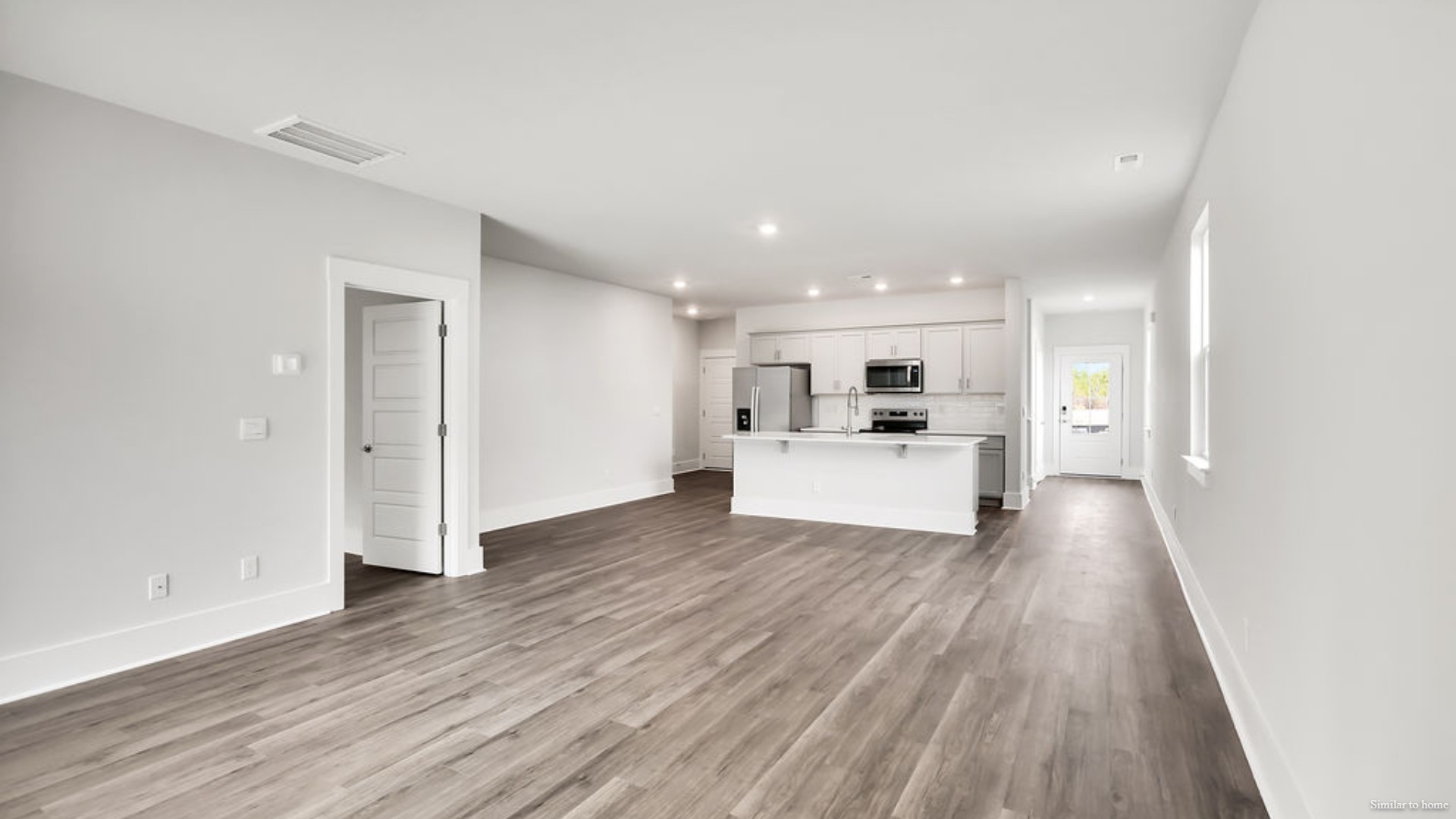 The living area is an open concept, where your kitchen, living, and dining areas blend seamlessly into a space perfect for everyday living and entertaining.