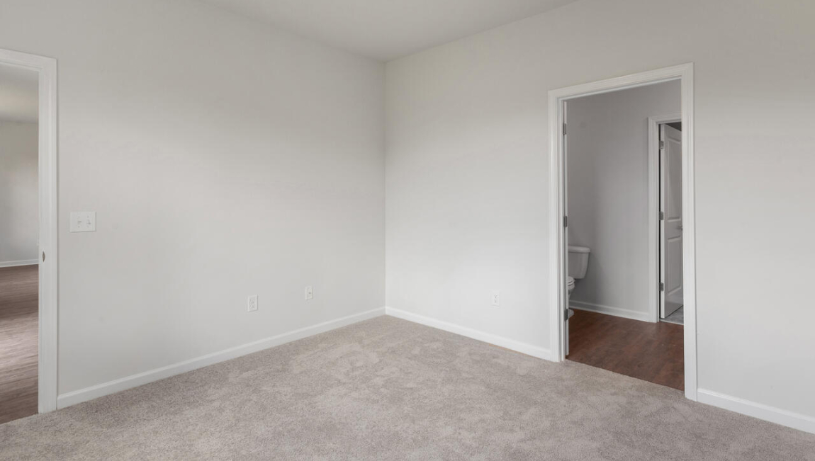 he primary suite is located at the back of the home and includes a walk-in closet and an en-suite bathroom for added comfort.