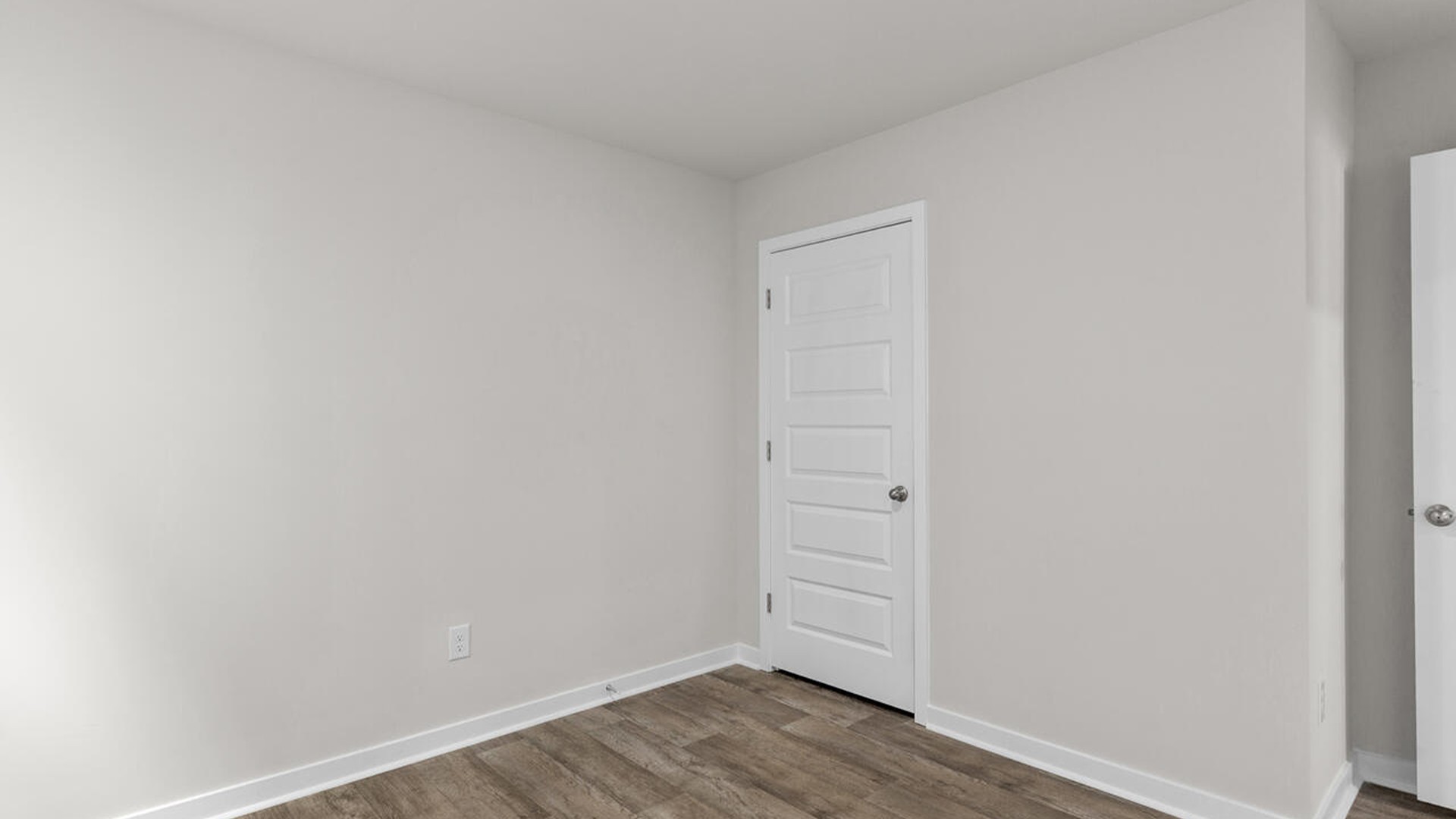 There are three additional bedrooms and full bath. In every bedroom you’ll have vinyl flooring and a closet in each room.