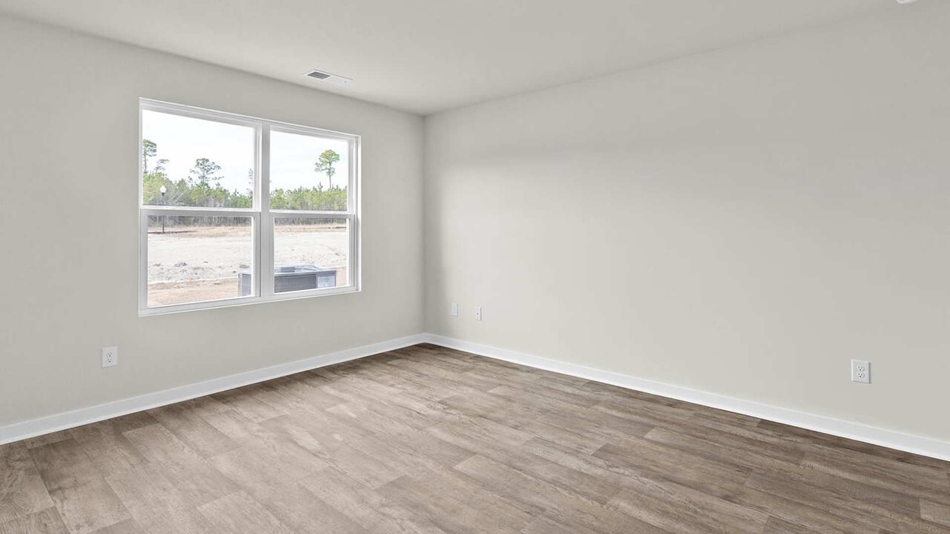 The primary bedroom has its own attached bathroom that features a walk-in closet and all the space you need to get ready in the morning.