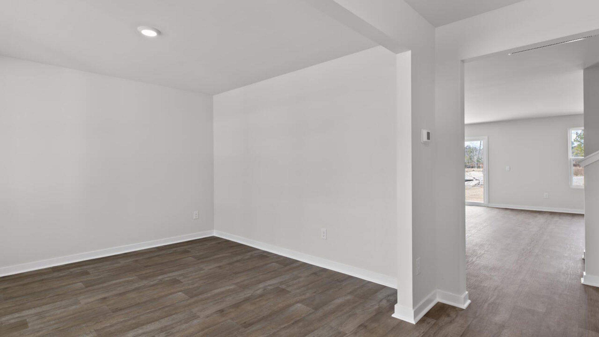 Downstairs, a flex room can be used as an office or sitting area.