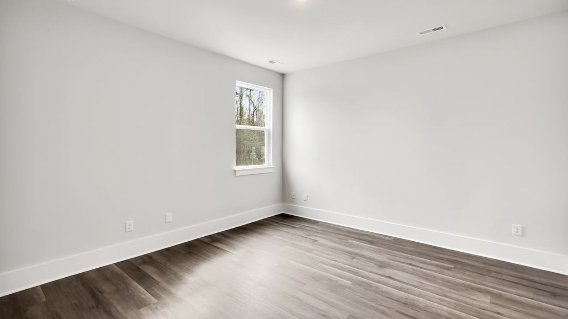 The primary bedroom has its own attached bathroom that features a walk-in closet and all the space you need to get ready in the morning.