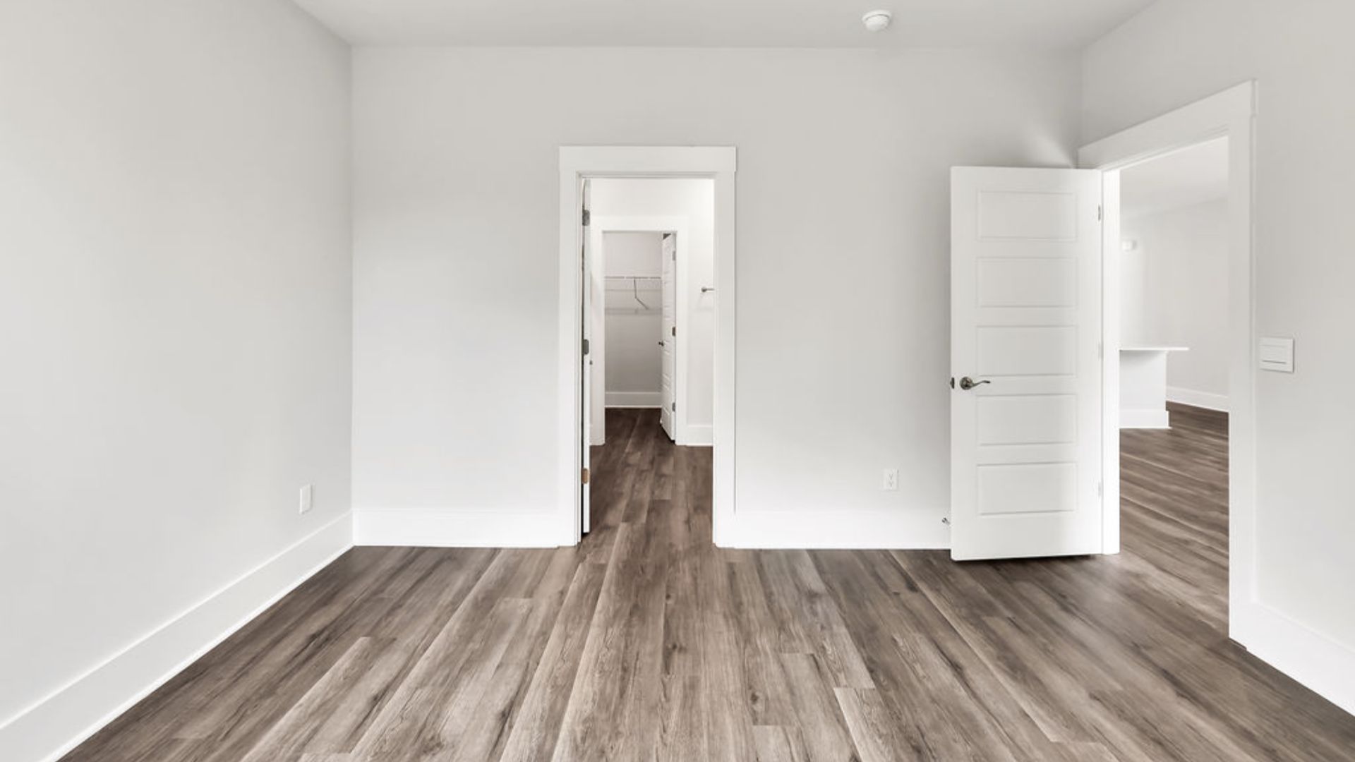 The primary bedroom has its own attached bathroom that features a walk-in closet and all the space you need to get ready in the morning.