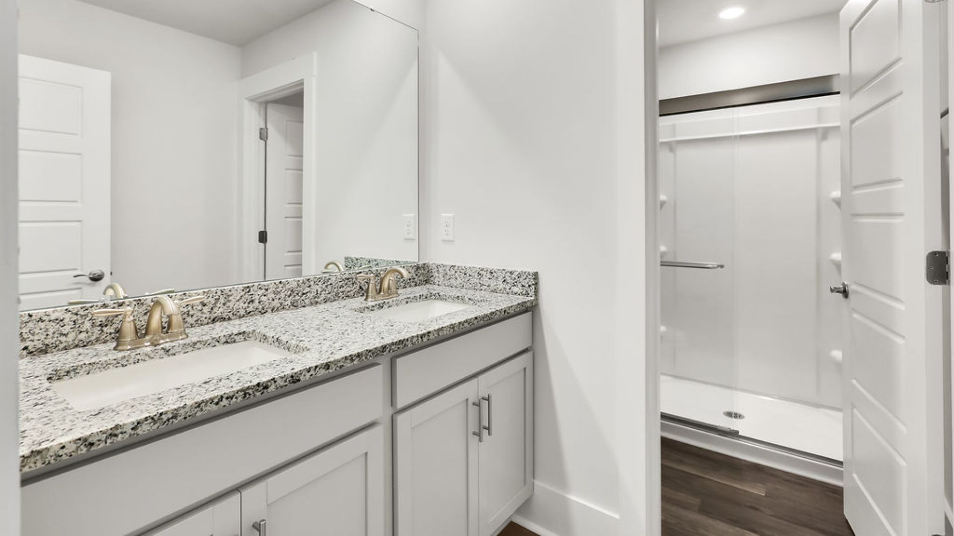 Upstairs, you will find three bedrooms, 2 baths, a large bonus room and loft. In every bedroom you’ll have vinyl floors and a closet in each room. Whether these rooms become bedrooms,