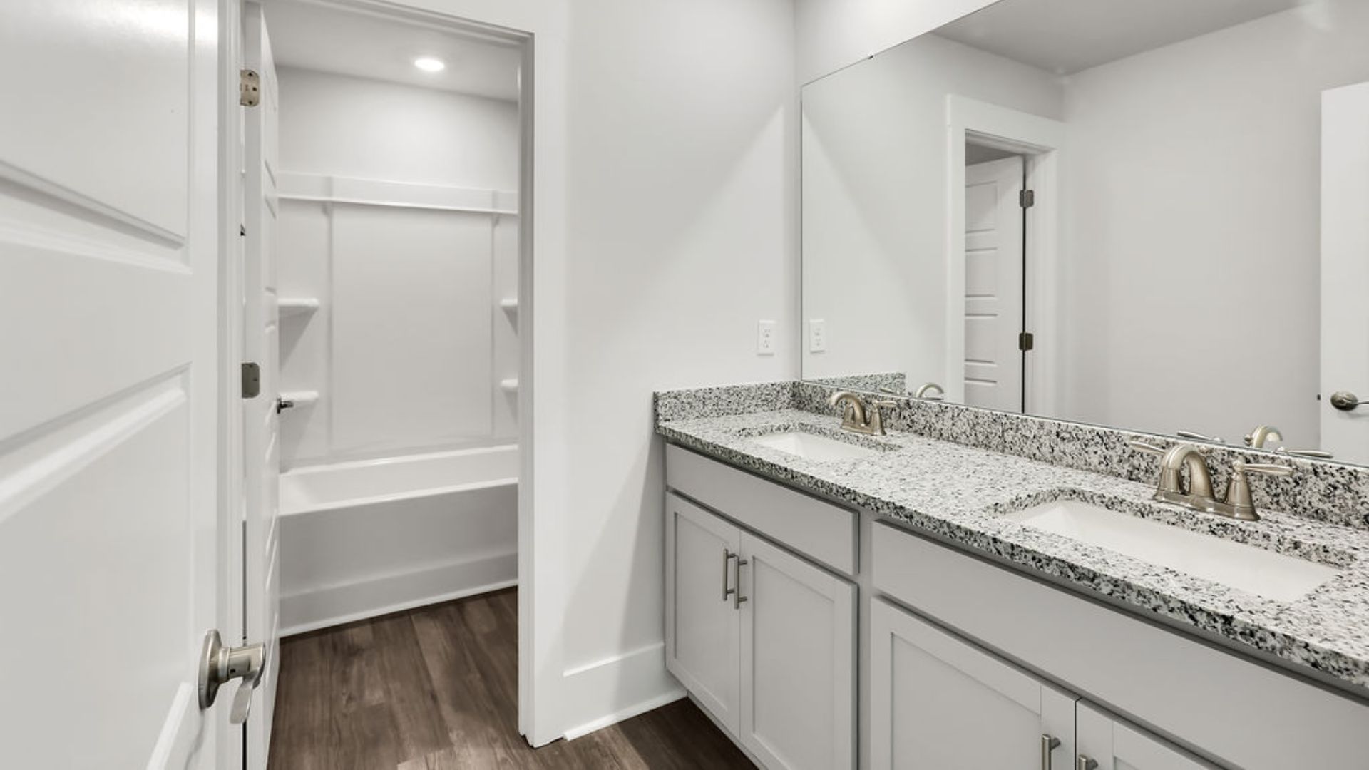 Upstairs, you will find three bedrooms, 2 baths, a large bonus room and loft. In every bedroom you’ll have vinyl floors and a closet in each room. Whether these rooms become bedrooms,