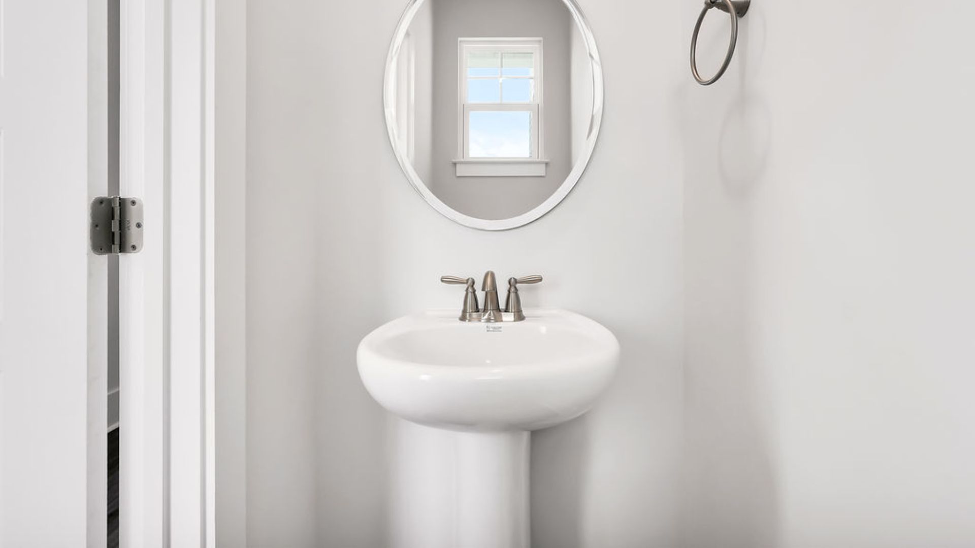 Downstairs, there is a half bath.