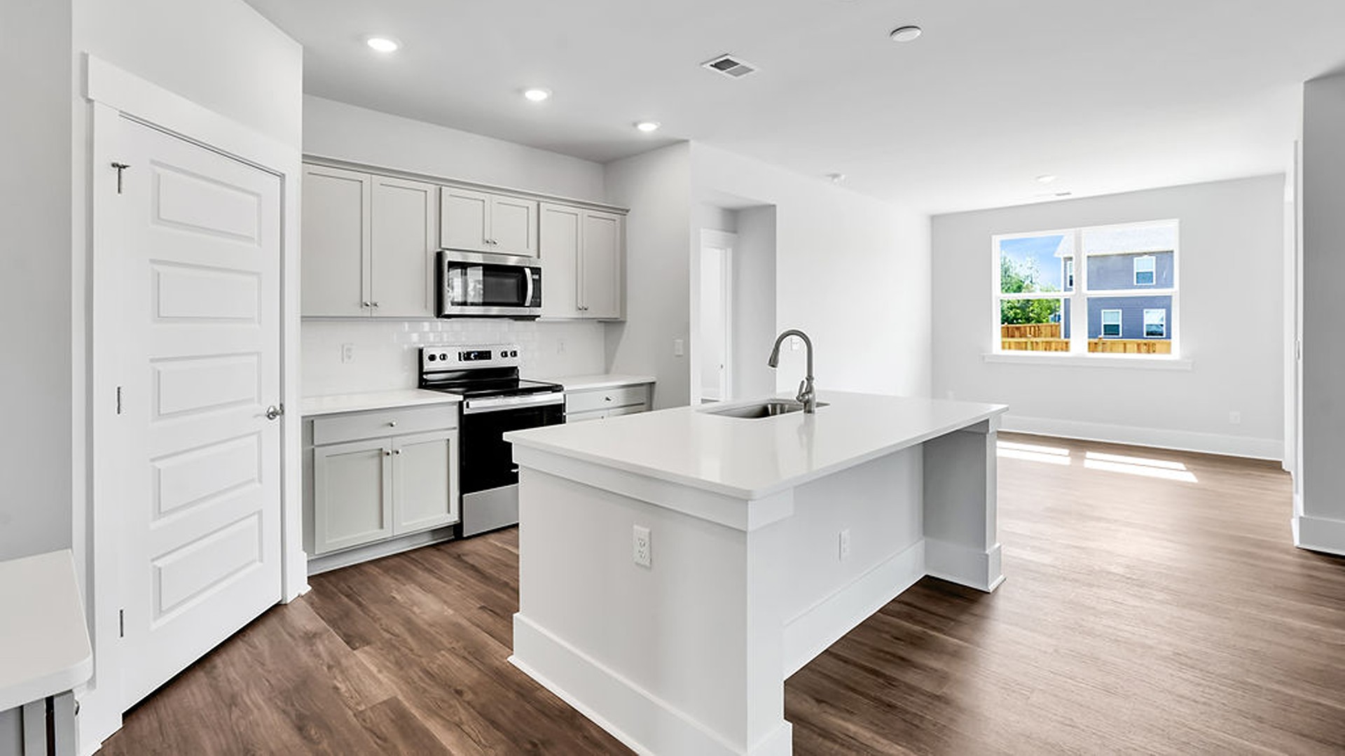! The kitchen comes finished with beautiful granite countertops, stainless steel appliances, single-bowl sink and tile backsplash. You’ll never be too far from the action with the living and dining area right there