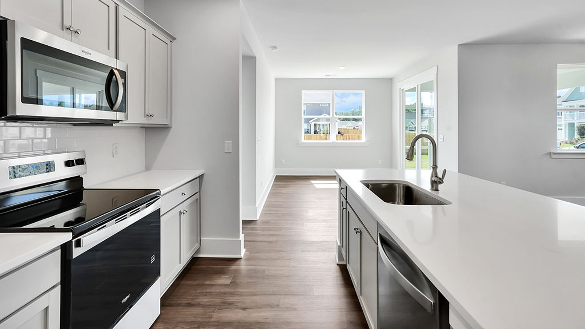 ! The kitchen comes finished with beautiful granite countertops, stainless steel appliances, single-bowl sink and tile backsplash. You’ll never be too far from the action with the living and dining area right there