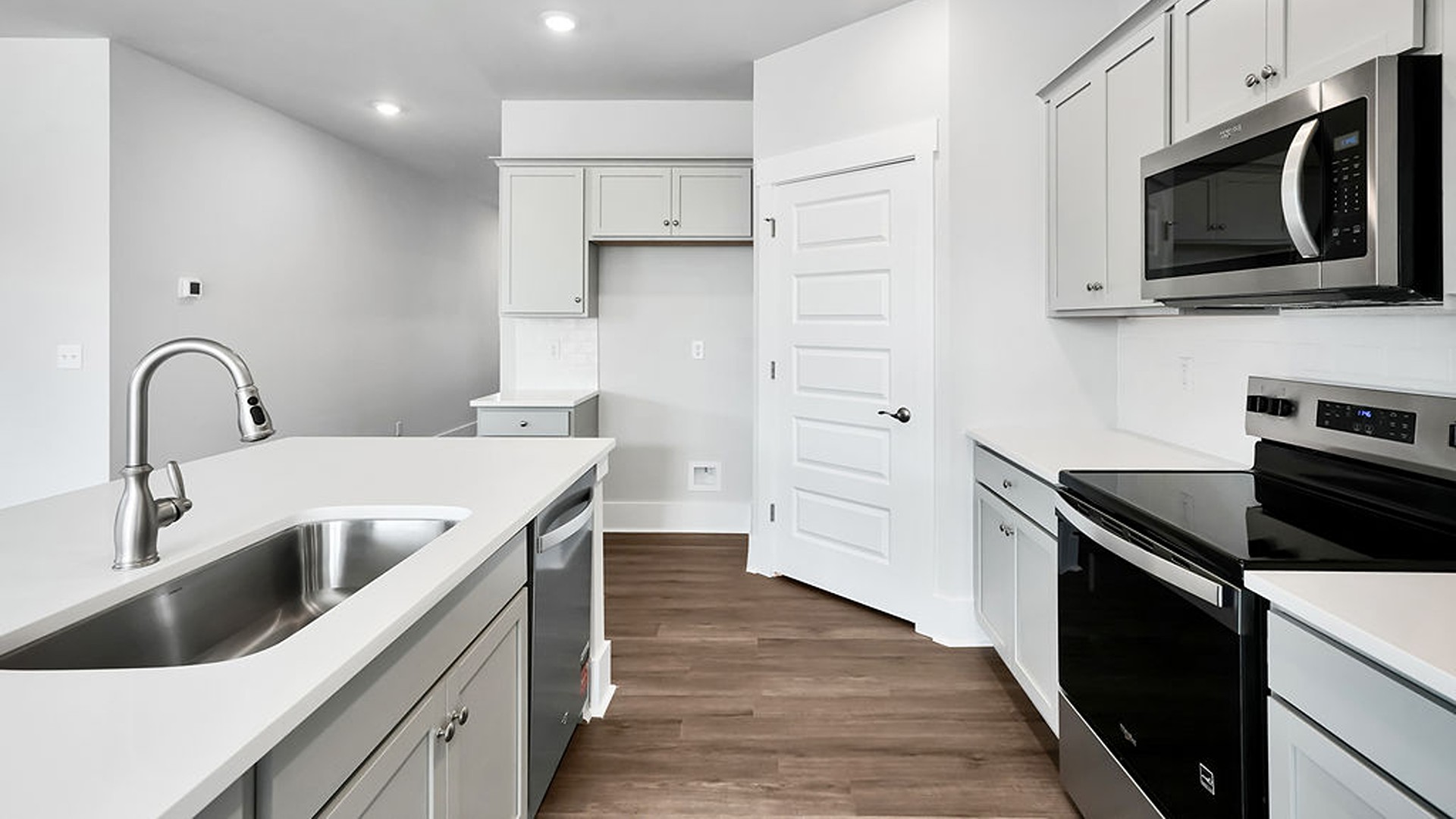 ! The kitchen comes finished with beautiful granite countertops, stainless steel appliances, single-bowl sink and tile backsplash. You’ll never be too far from the action with the living and dining area right there