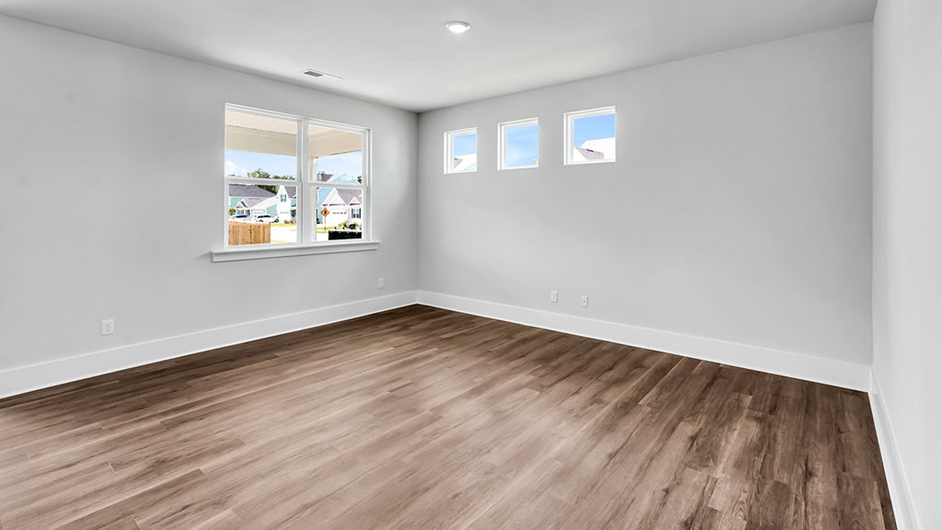 The Bradford is a versatile plan with an open concept kitchen, living, and dining area! T