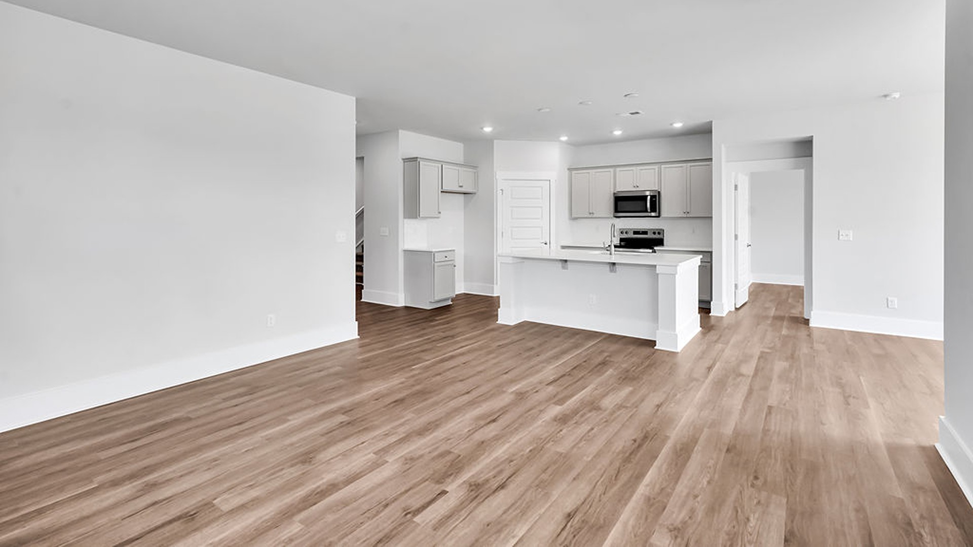 The Bradford is a versatile plan with an open concept kitchen, living, and dining area! T