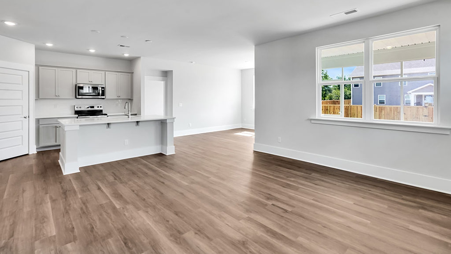 The Bradford is a versatile plan with an open concept kitchen, living, and dining area! T