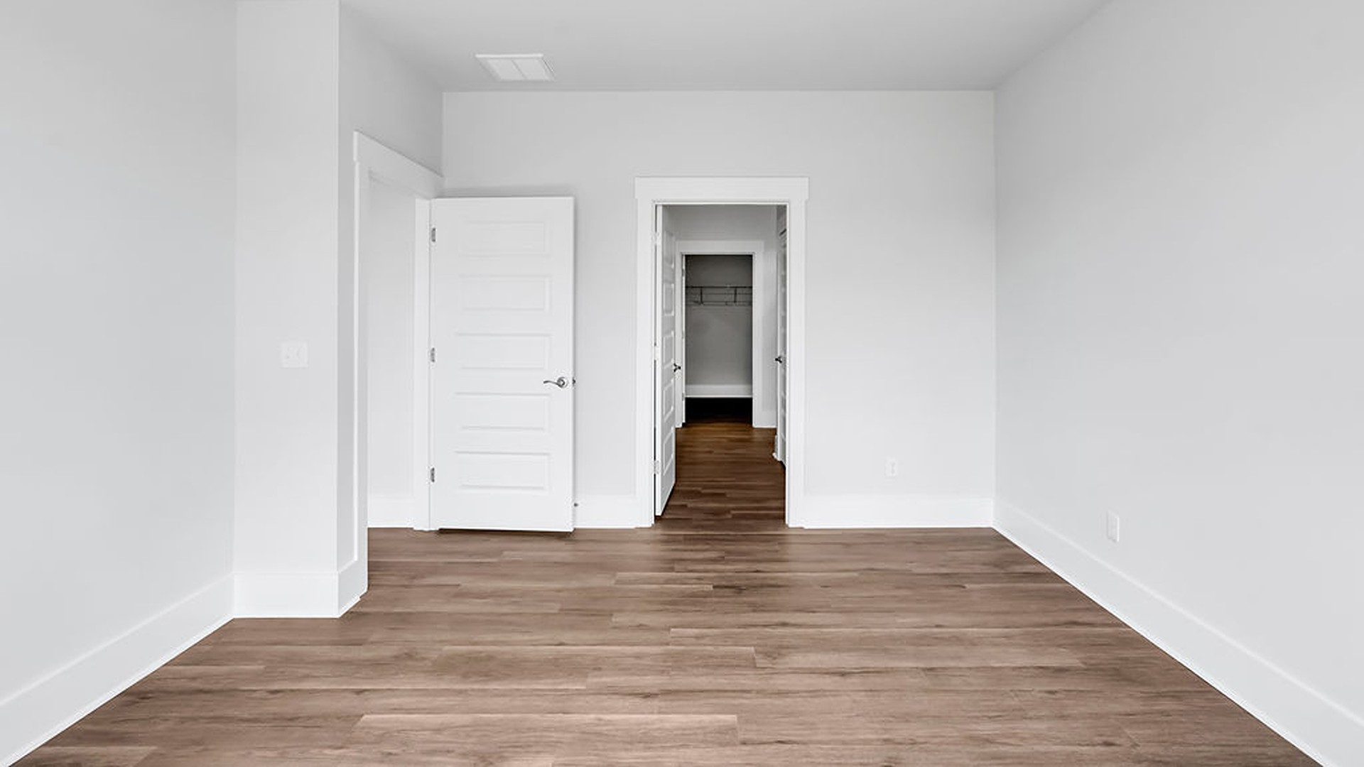 The primary bedroom has its own attached bathroom that features a walk-in closet and all the space you need to get ready in the morning