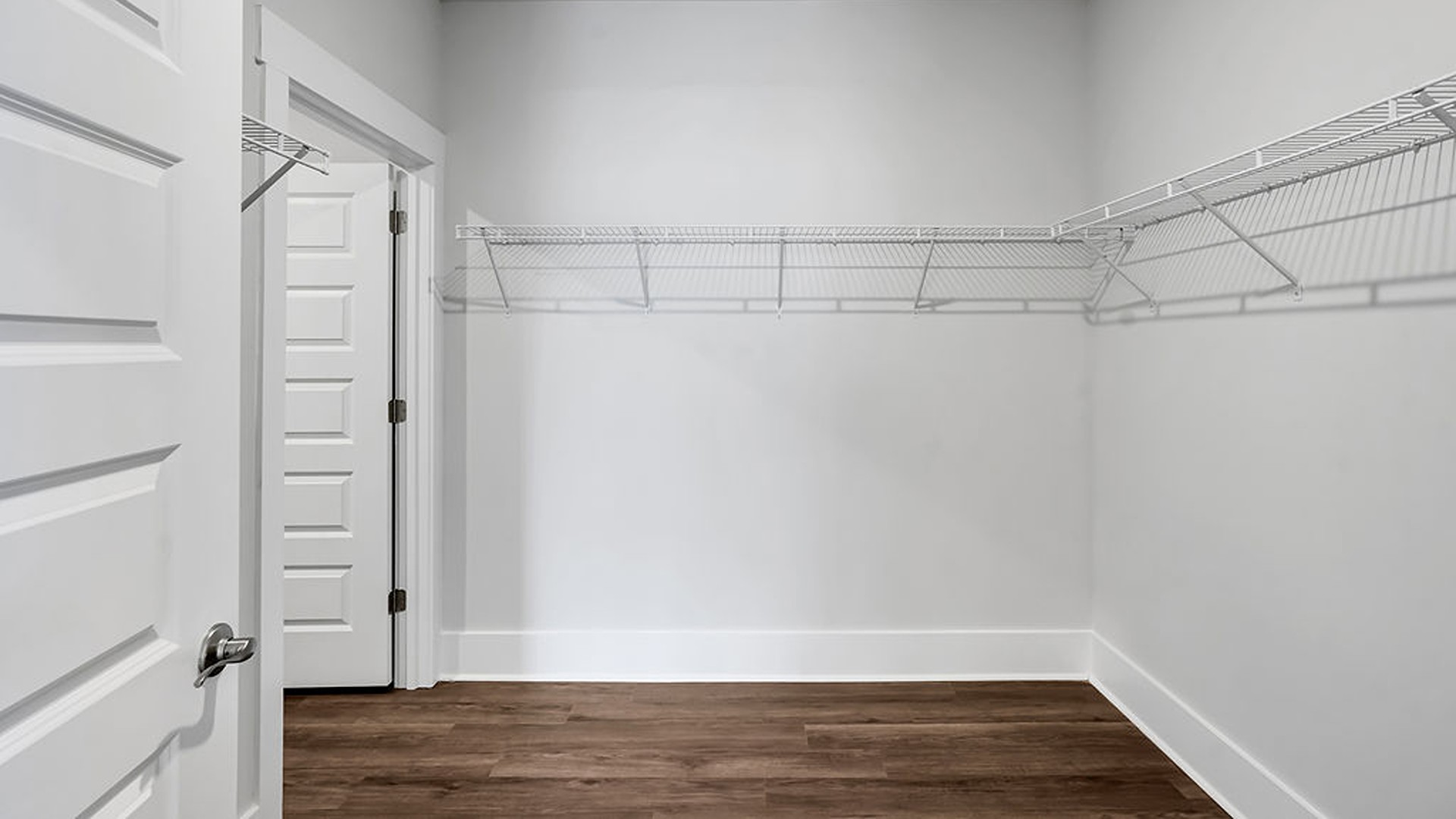The primary bedroom has its own attached bathroom that features a walk-in closet and all the space you need to get ready in the morning