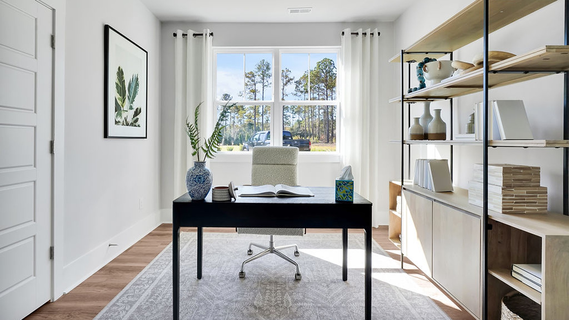 This charming home offers 3 spacious bedrooms, a French-door flex room that is perfect for an office or formal dining space,