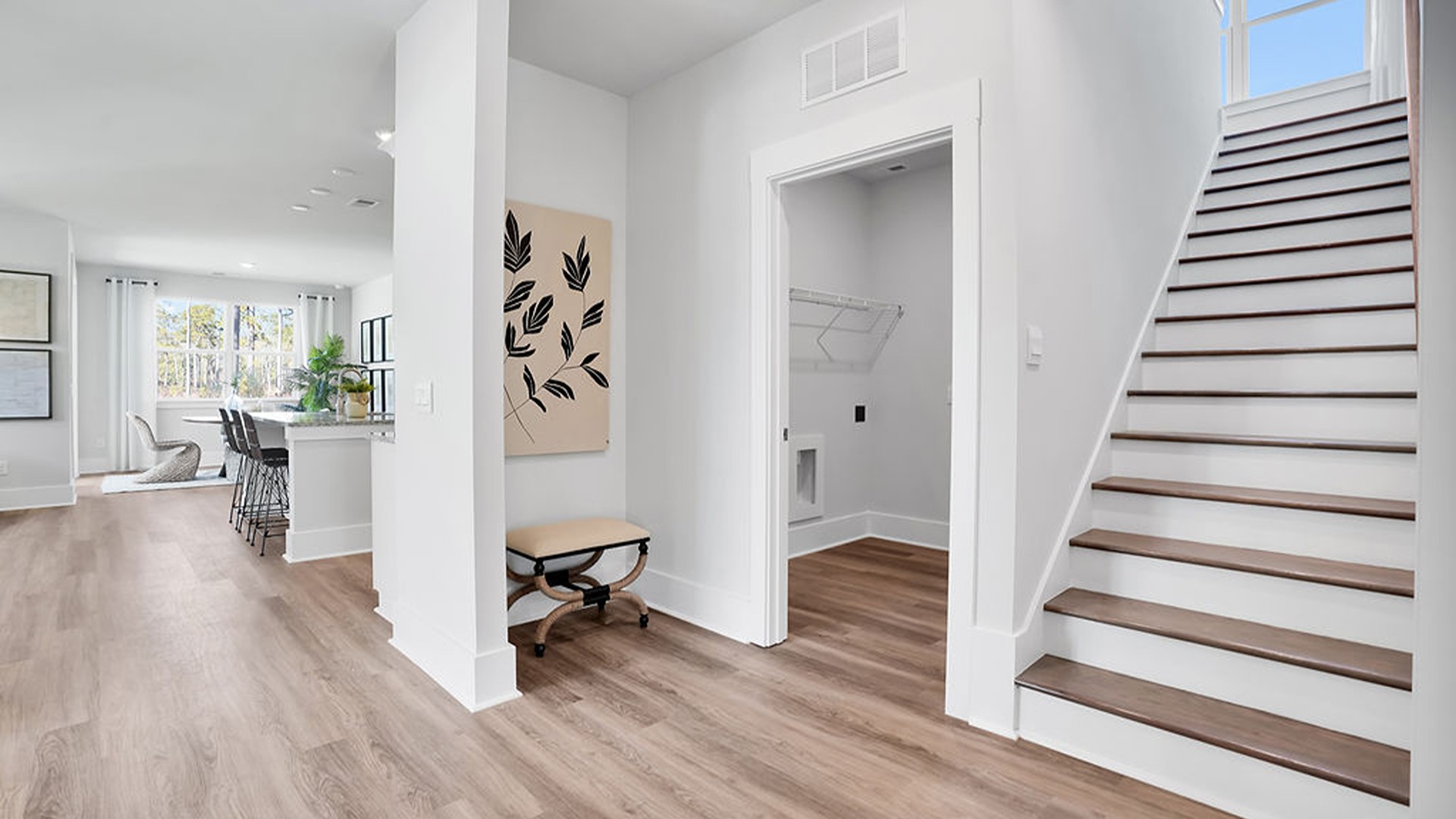 a French-door flex room that is perfect for an office or formal dining space, 3 full baths, and a versatile upstairs bonus room.