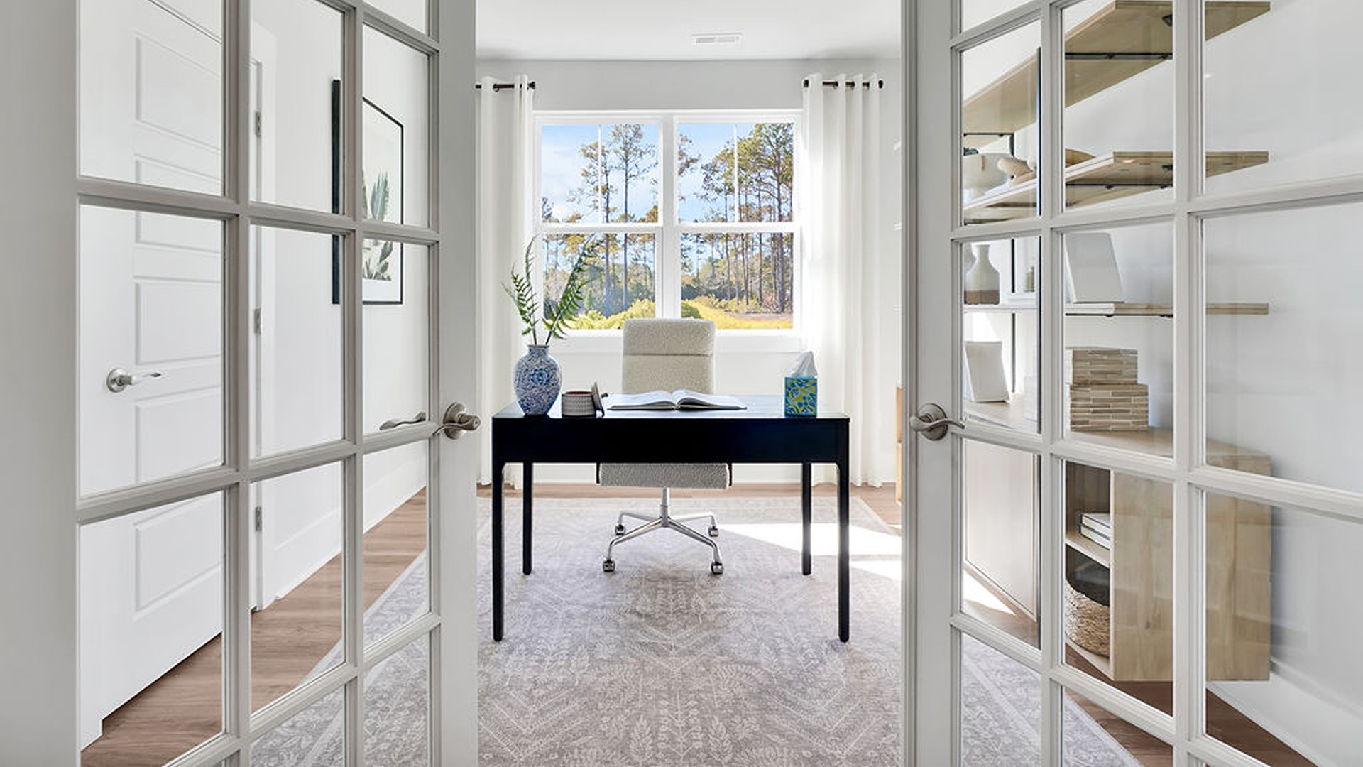 French-door flex room that is perfect for an office or formal dining space