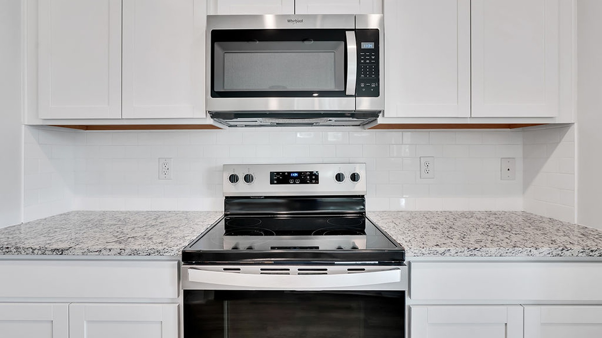 The Bradford is a versatile plan with an open concept kitchen, living, and dining area! The kitchen comes finished with beautiful granite countertops, stainless steel appliances, single-bowl sink and tile backsplash