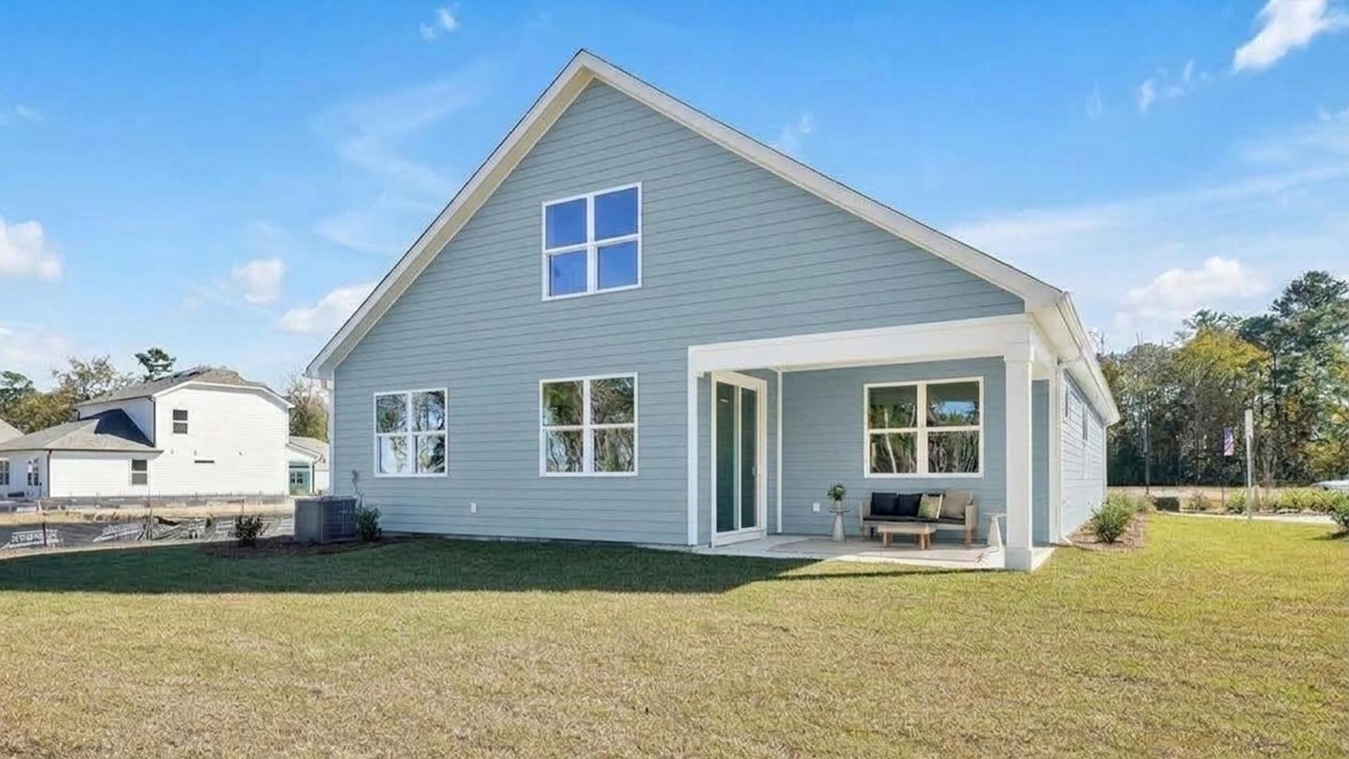 Enjoy the covered porch perfect for entertaining and enjoying the Carolina evenings.