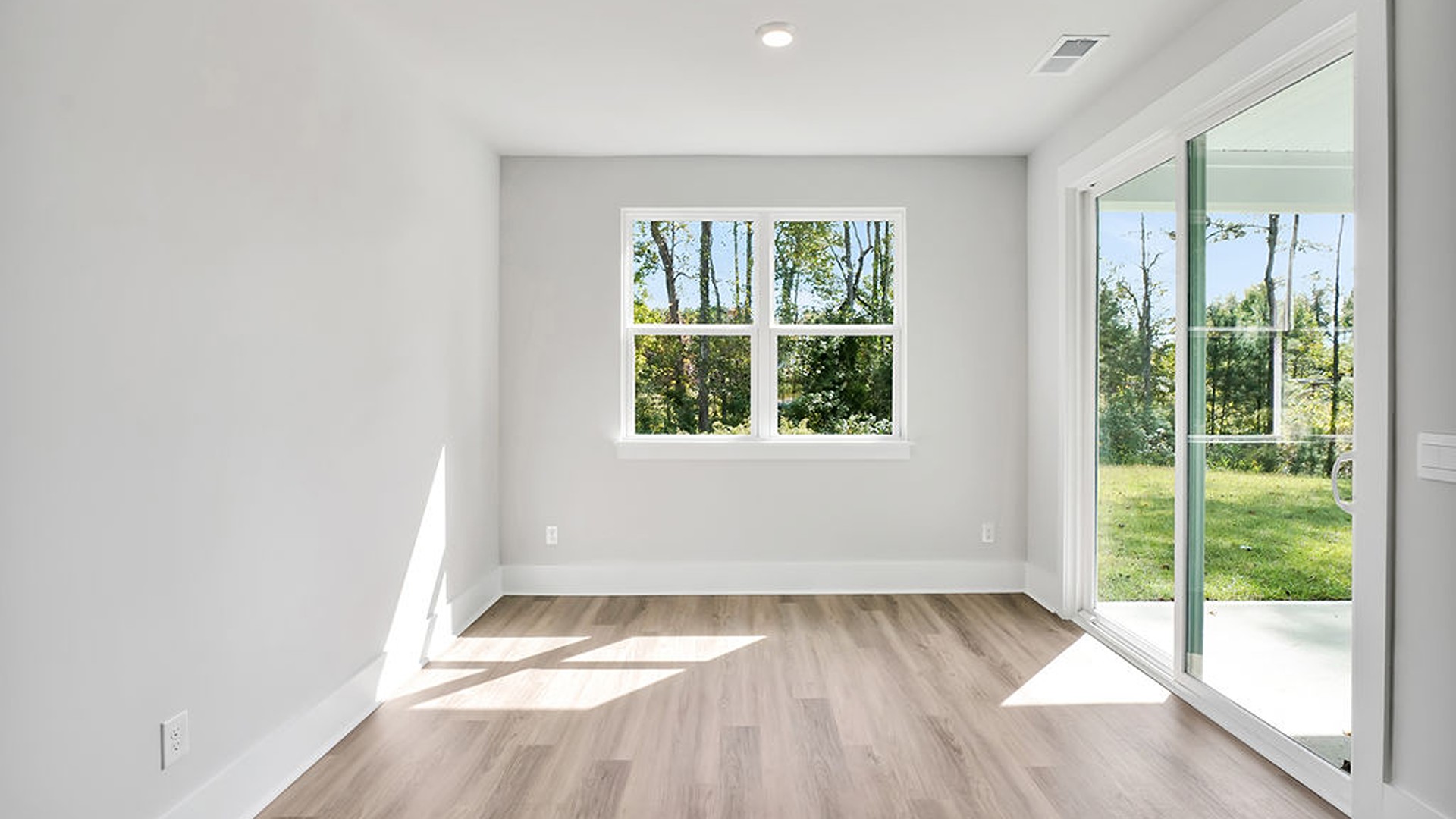 The Bradford is a versatile plan with an open concept kitchen, living, and dining area! The kitchen comes finished with beautiful granite countertops, stainless steel appliances, single-bowl sink