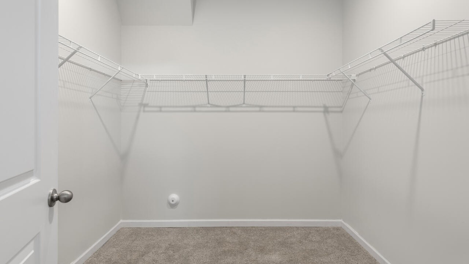 A large primary suite with bath that features separate sinks, granite countertops and a large walk-in closet. Whether these rooms become bedrooms, office spaces, or other bonus rooms, there is sure to be comfort.