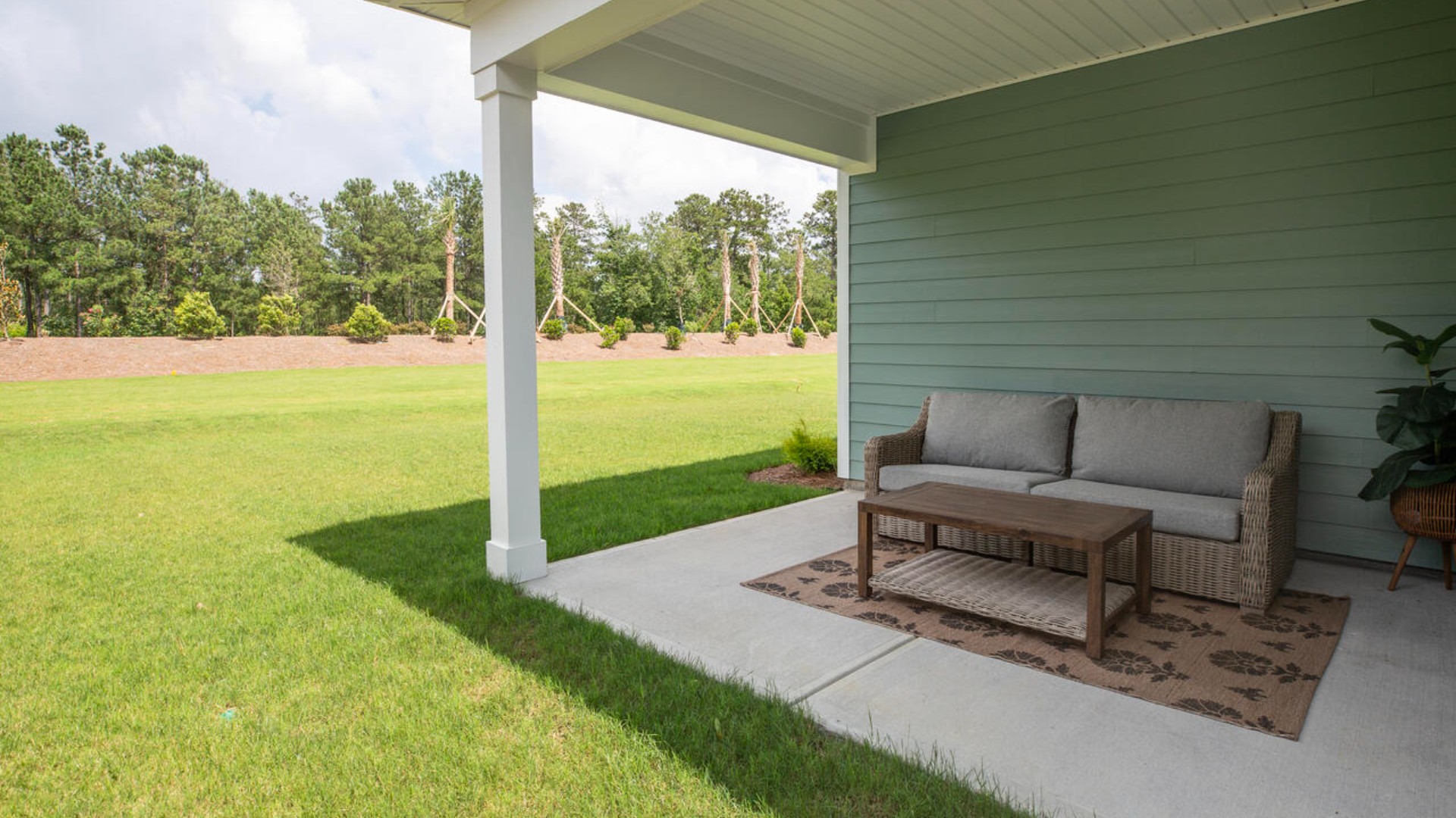 Enjoy the covered porch perfect for entertaining and enjoying the Carolina evenings.