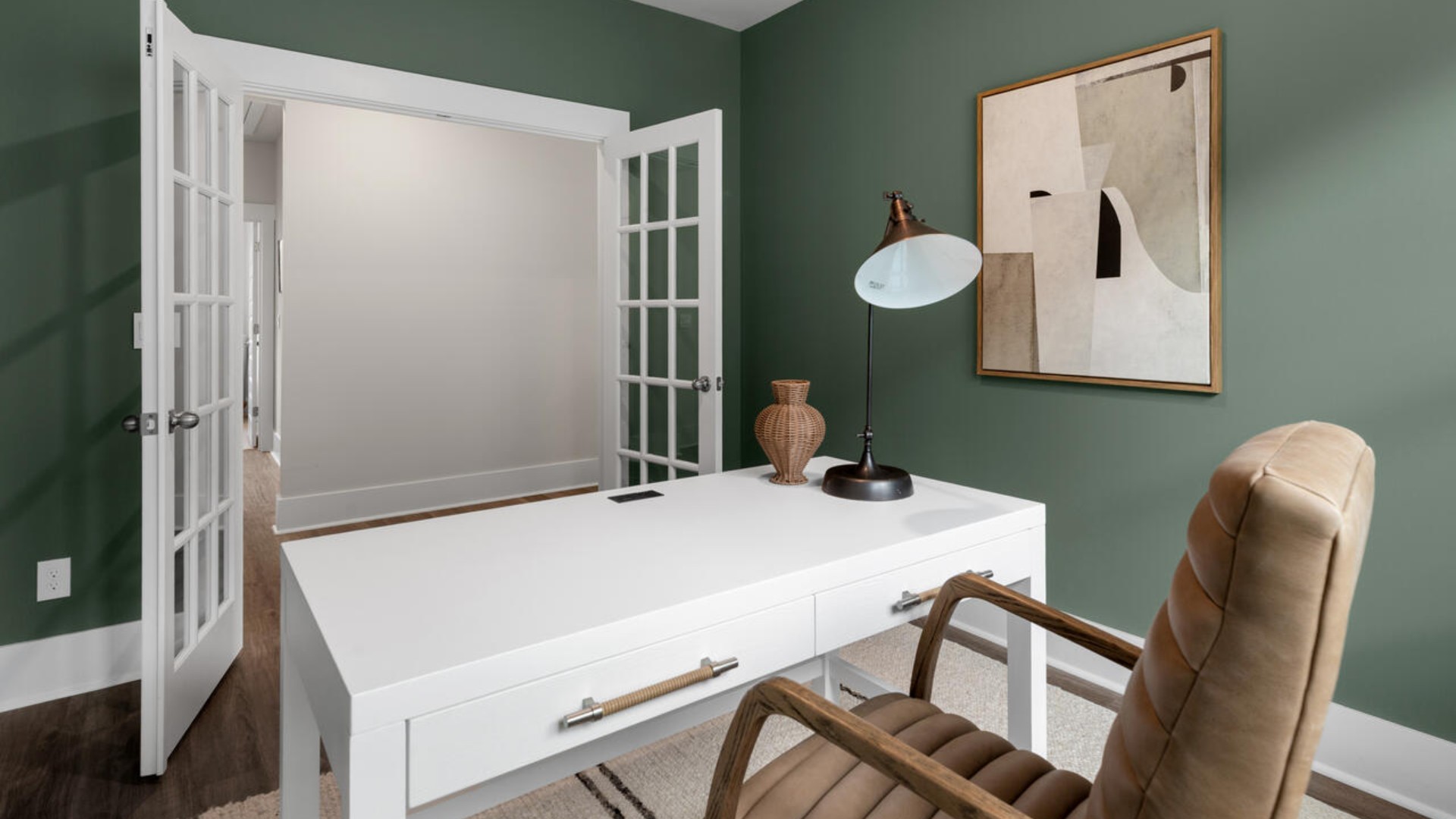 French doors lead into the private study/office area.