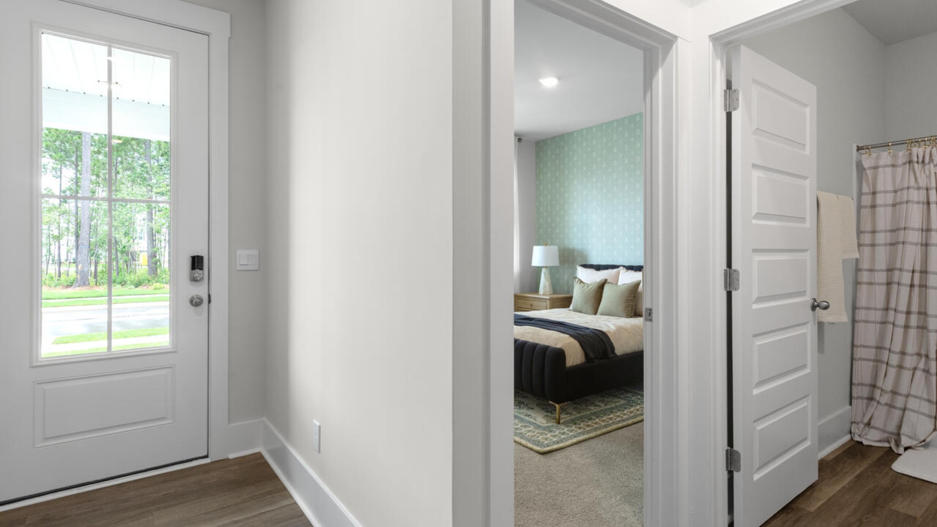 This open concept home features 9 ft. ceilings, granite kitchen counter tops, walk-in pantry, over-sized kitchen island, ample storage space, and granite countertops in the bathrooms.