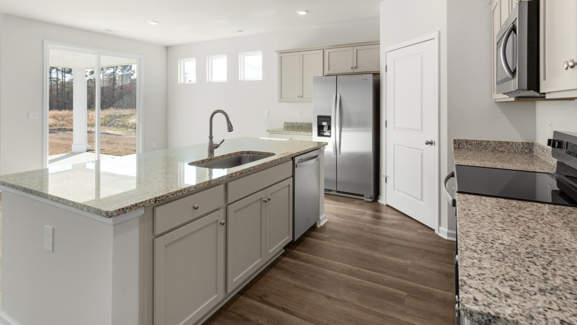 This new home will feature 9 ft. ceilings, quartz kitchen countertops