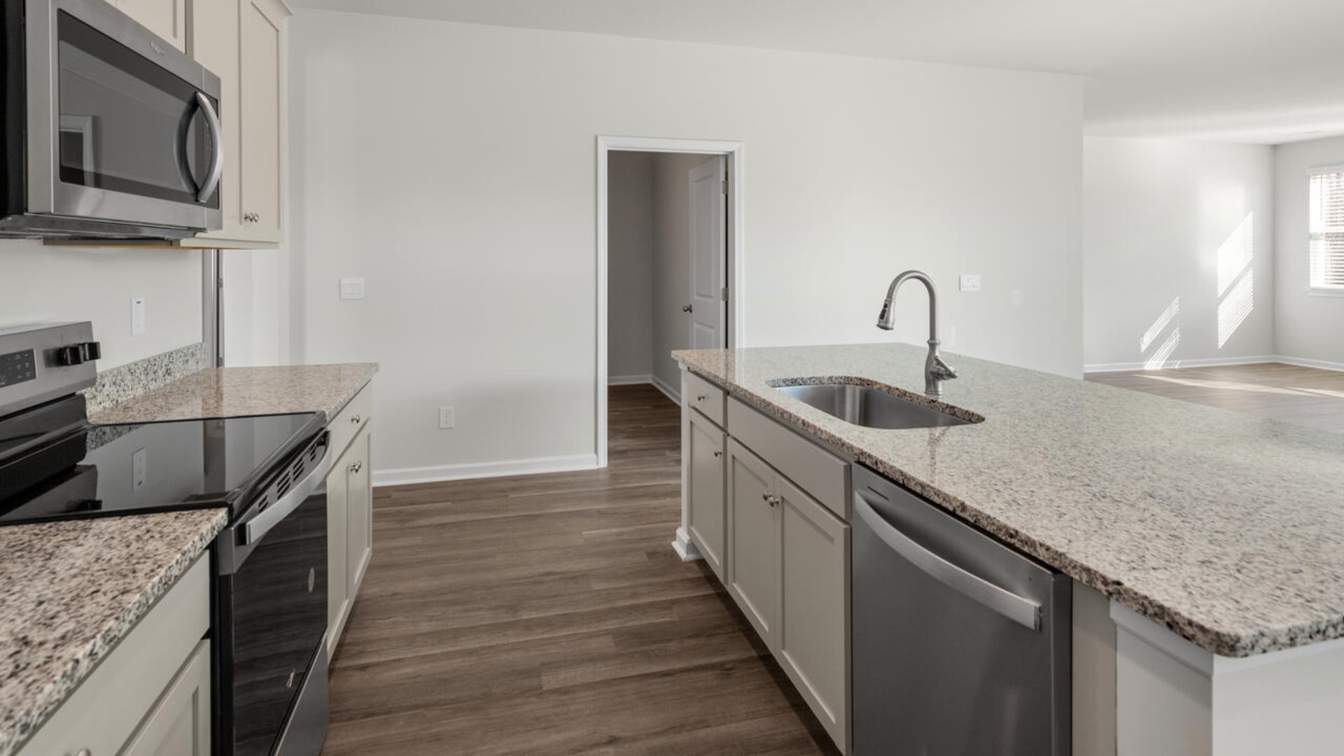 This new home will feature 9 ft. ceilings, quartz kitchen countertops