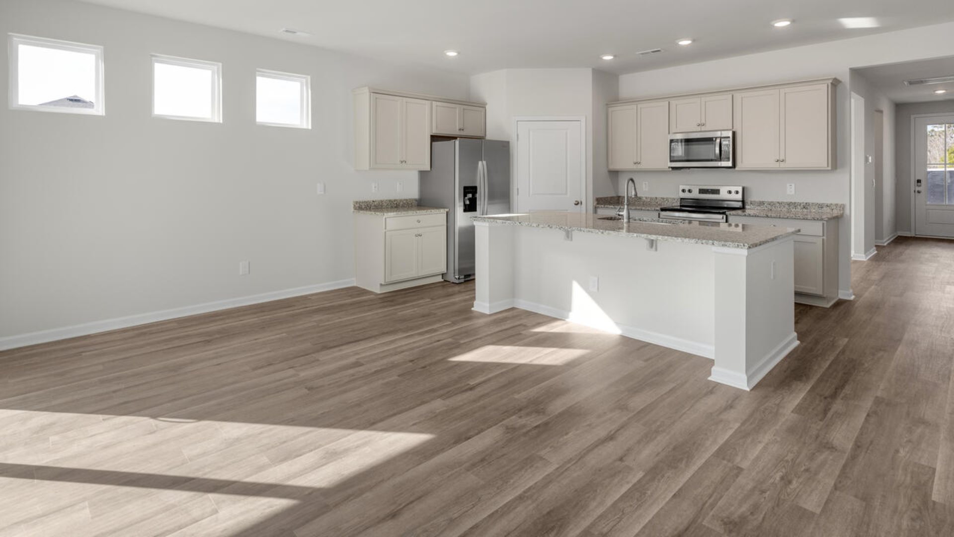 This new home will feature 9 ft. ceilings, quartz kitchen countertops