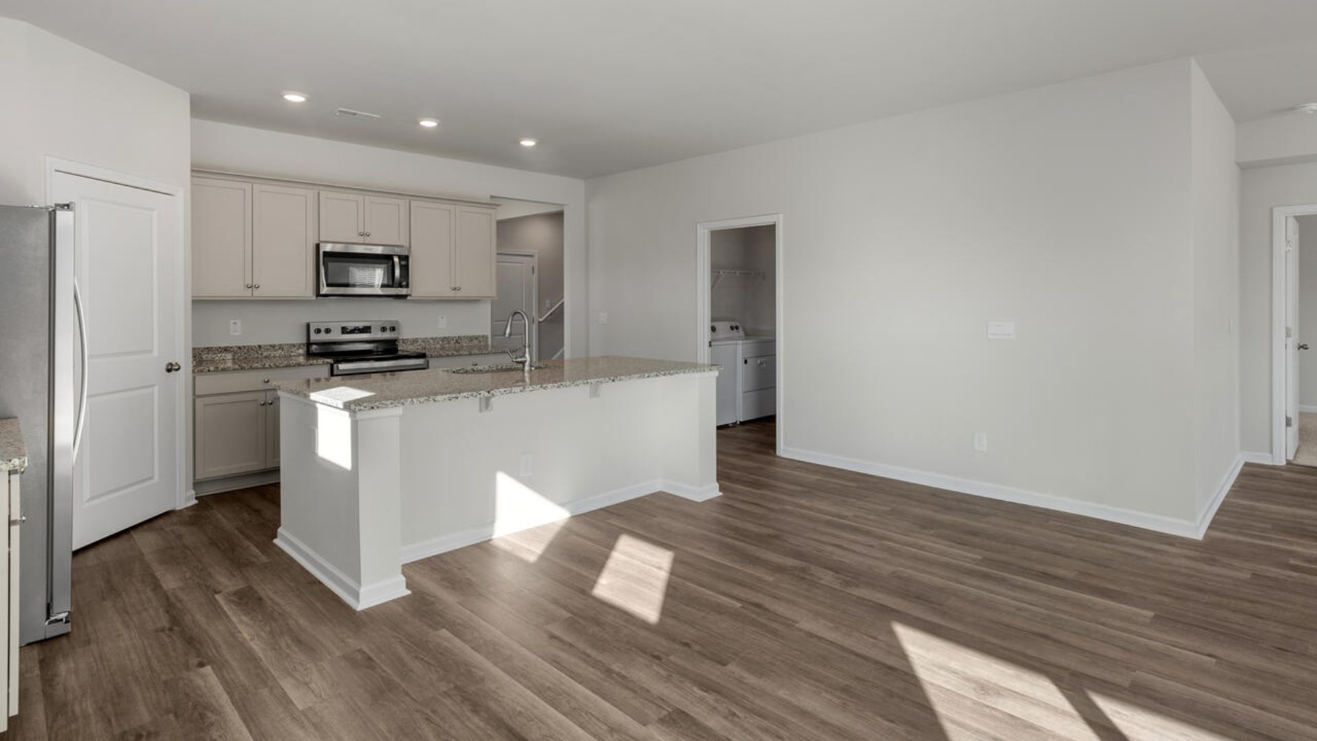 This new home will feature 9 ft. ceilings, quartz kitchen countertops