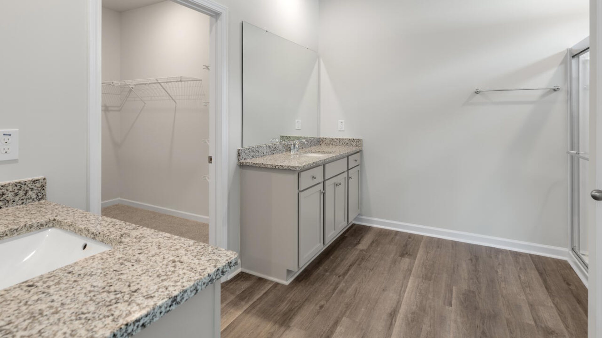 The primary bedroom has its own attached bathroom that features a walk-in closet and all the space you need to get ready in the morning. Sharing a sink isn’t a worry with the double vanity, and you also get additional privacy with a separate door for the toilet and shower.