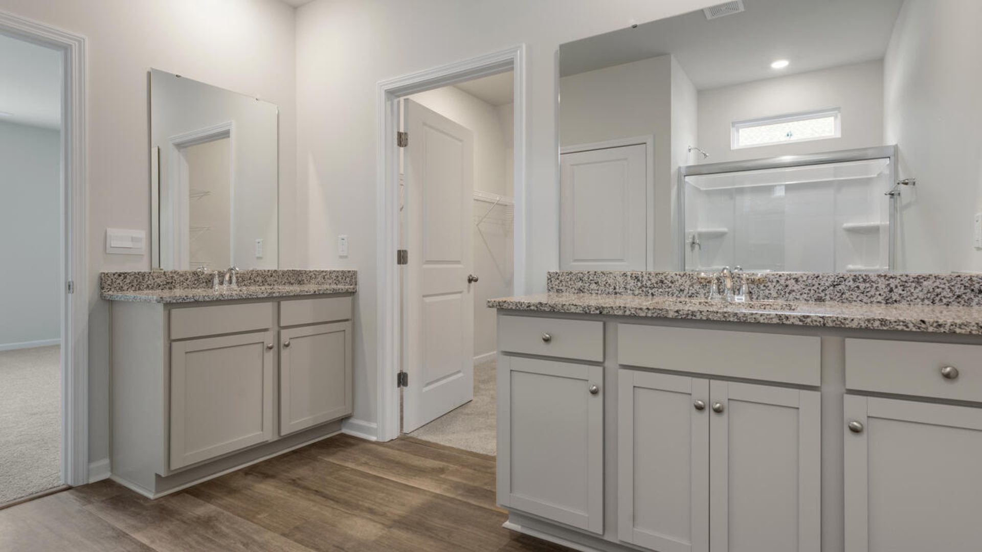 The primary bedroom has its own attached bathroom that features a walk-in closet and all the space you need to get ready in the morning. Sharing a sink isn’t a worry with the double vanity, and you also get additional privacy with a separate door for the toilet and shower.