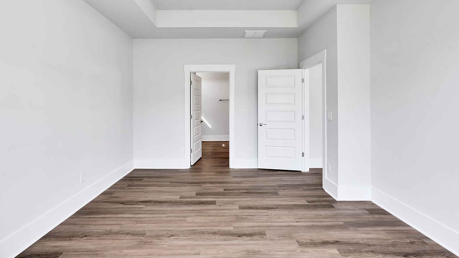 The primary bedroom has its own attached bathroom that features a walk-in closet and all the space you need to get ready in the morning. Sh
