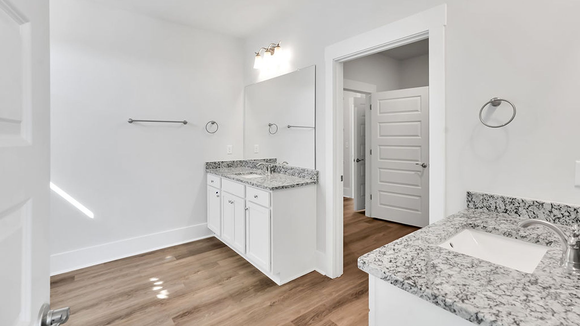 The primary bedroom has its own attached bathroom that features a walk-in closet and all the space you need to get ready in the morning. Sh