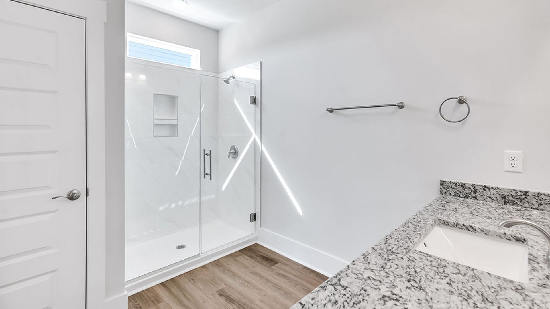 The primary bedroom has its own attached bathroom that features a walk-in closet and all the space you need to get ready in the morning. Sh