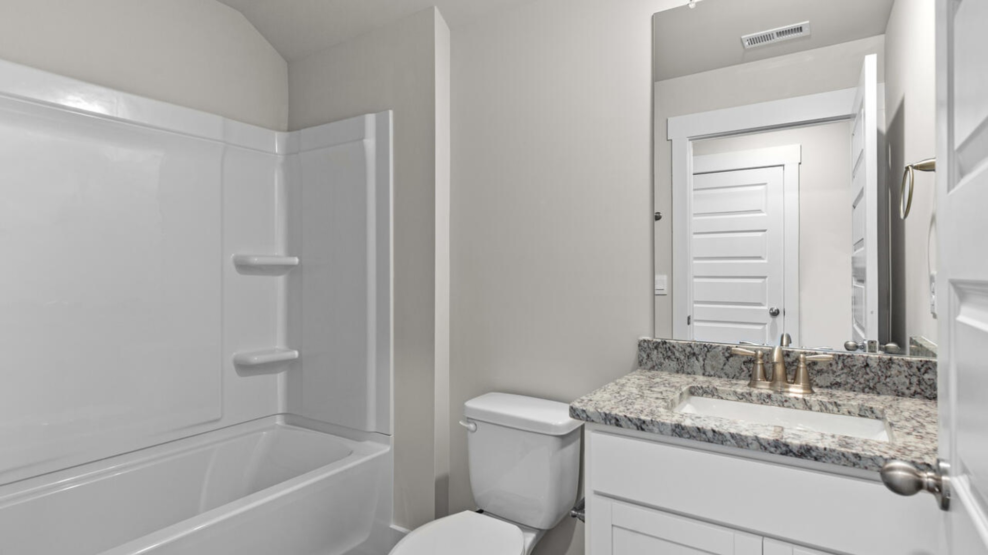 There is an upstairs bonus room, bedroom and bath.