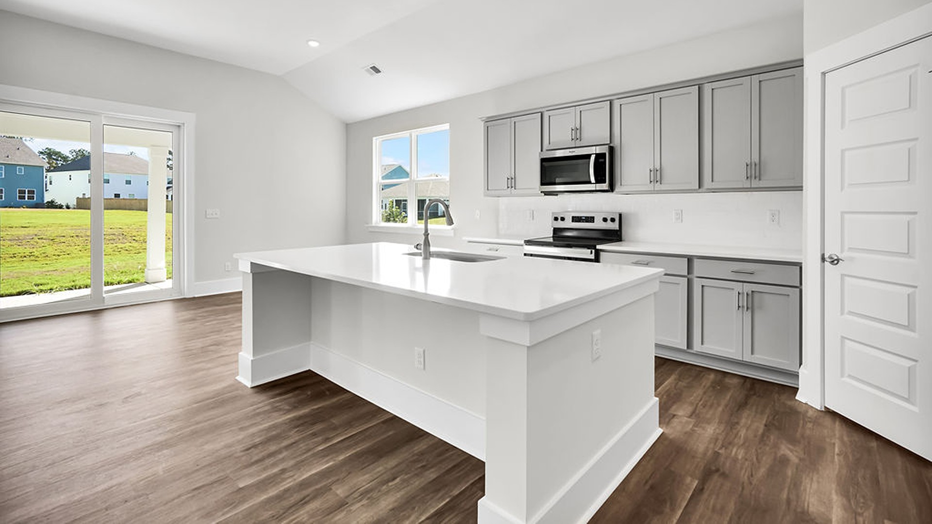 The Litchfield is a perfect home for relaxation and entertaining with a very open floor plan, 11-foot-high ceiling, and a large gourmet kitchen with granite countertops, tile backsplash, walk-in pantry, and stainless-steel appliances in kitchen.