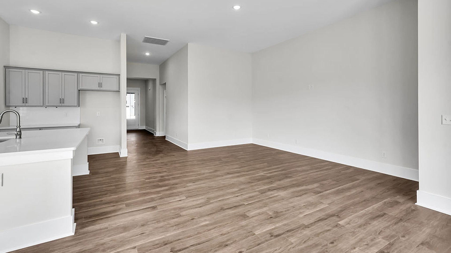 The living area is an open concept, where your kitchen, living, and dining areas blend seamlessly into a space perfect for everyday living and entertaining.